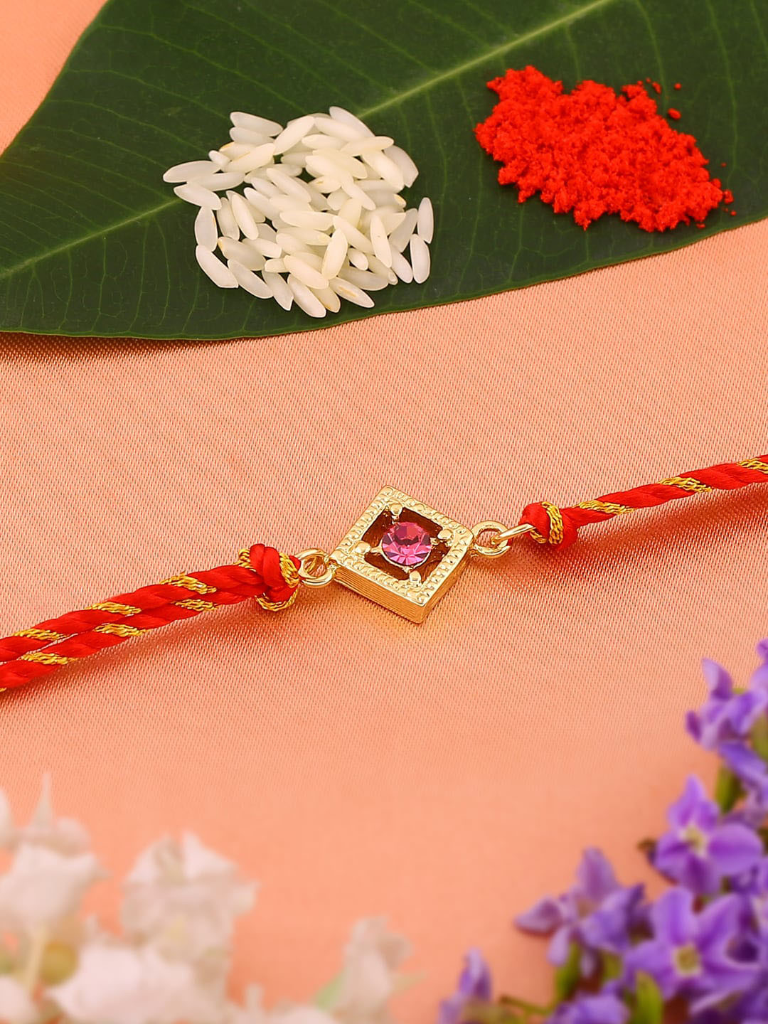 

Estele Unisex Gold-plated Crystal-Studded Rakhi