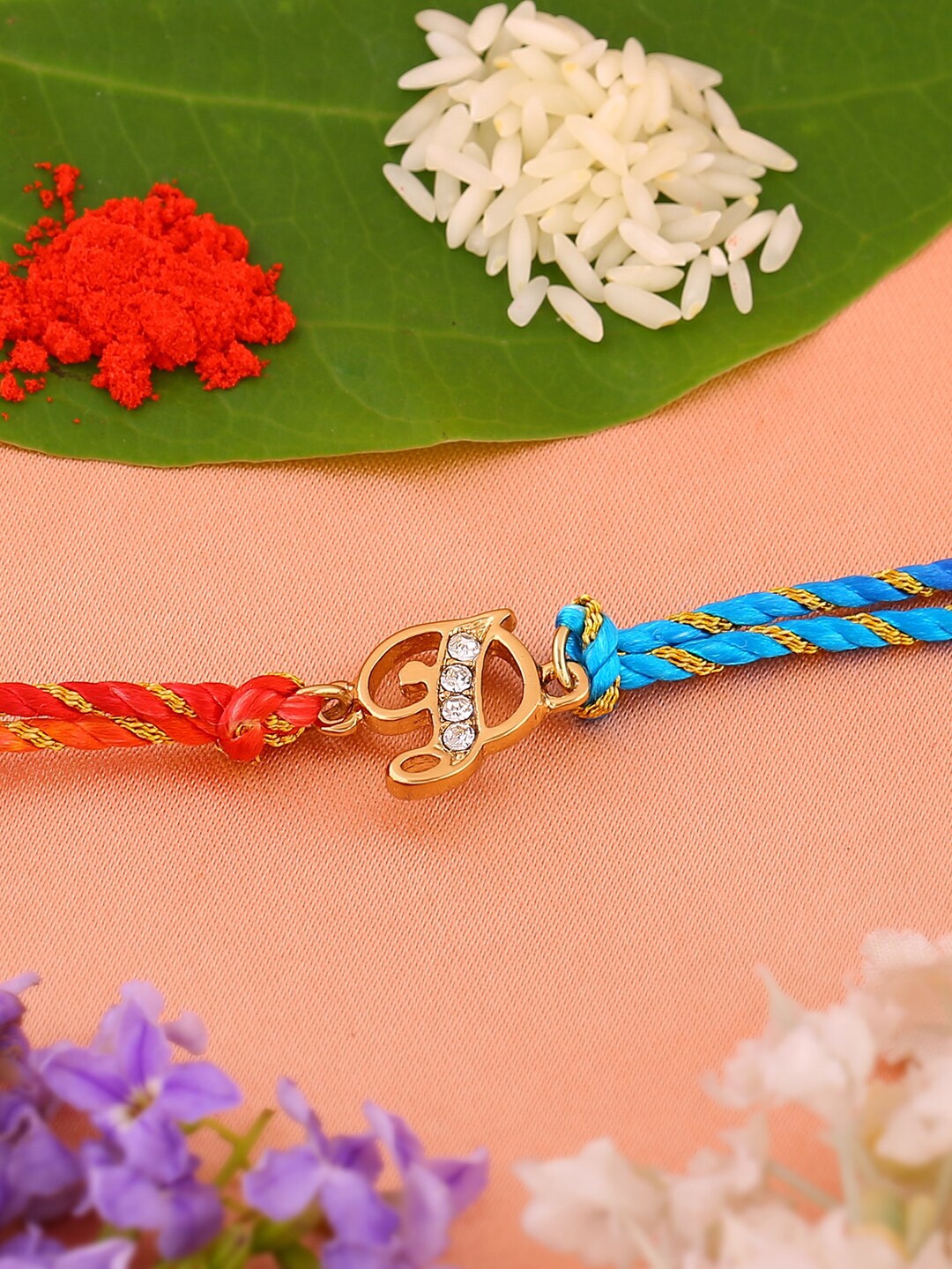 

Estele Unisex Gold-Plated Crystal-Studded Rakhi