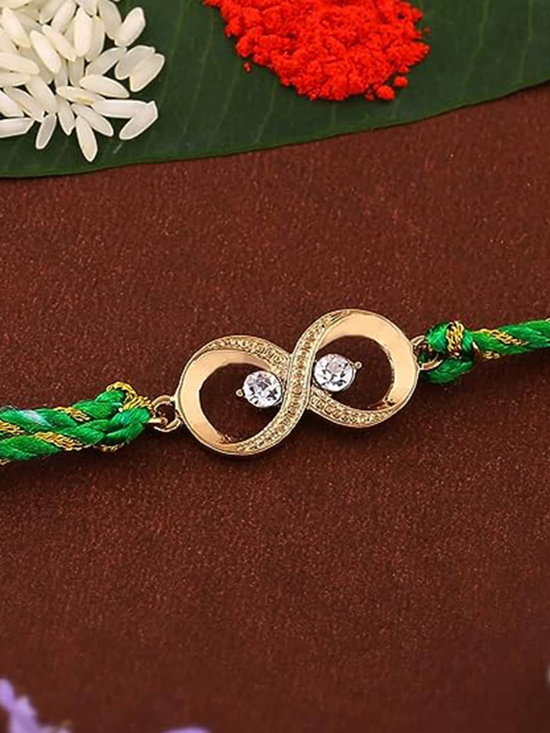 

Estele Unisex Gold-Plated Crystal-Studded Rakhi