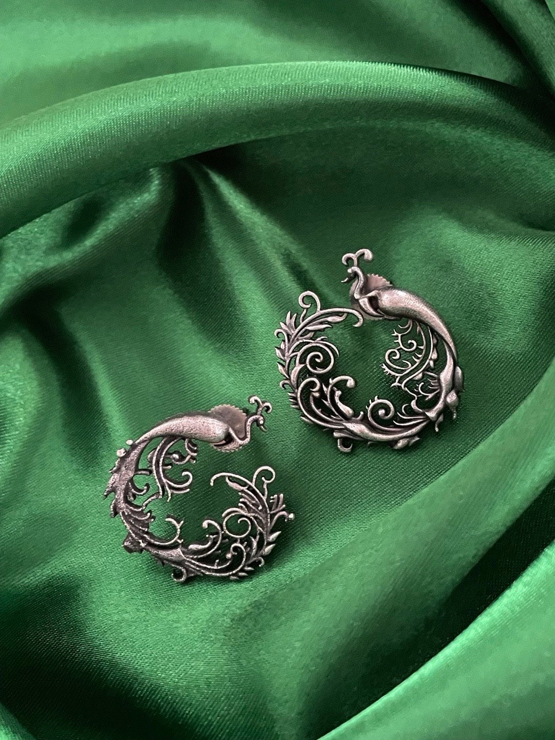 

Digital Dress Room Silver-Plated Peacock Oxidized Shaped Studs Earrings