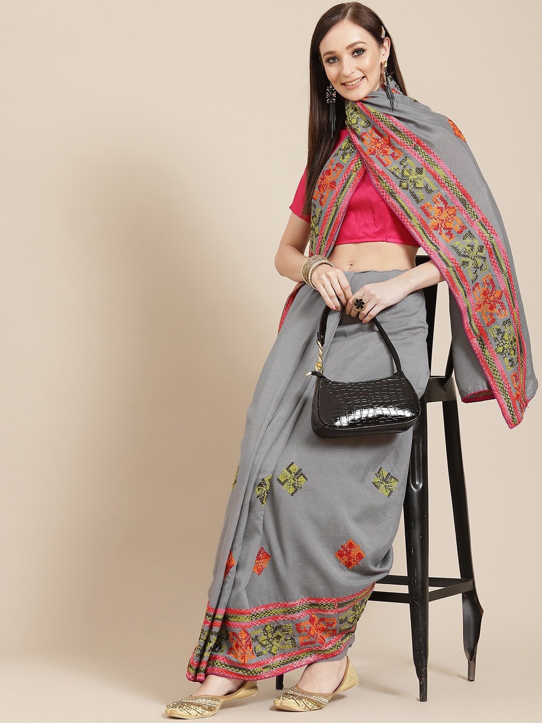 

Mitera Grey & Red Ethnic Motifs Embroidered Saree