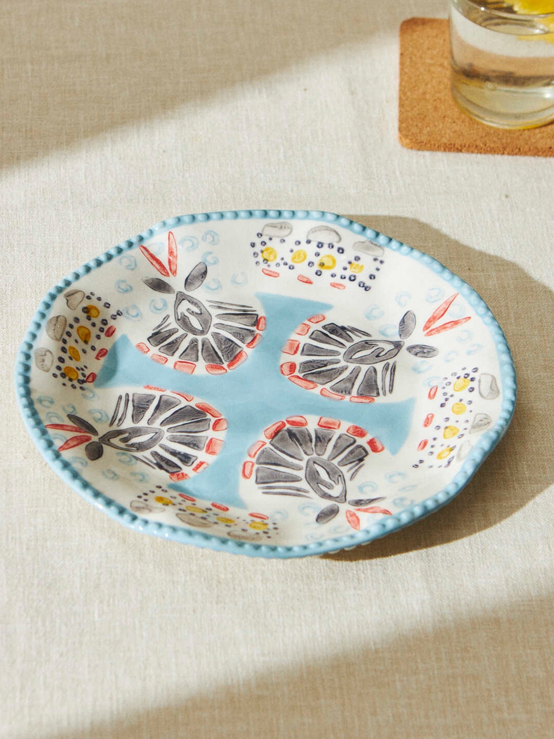 

Chumbak Blue & Orange Printed Porcelain Microwave Safe Matte Quarter Plate