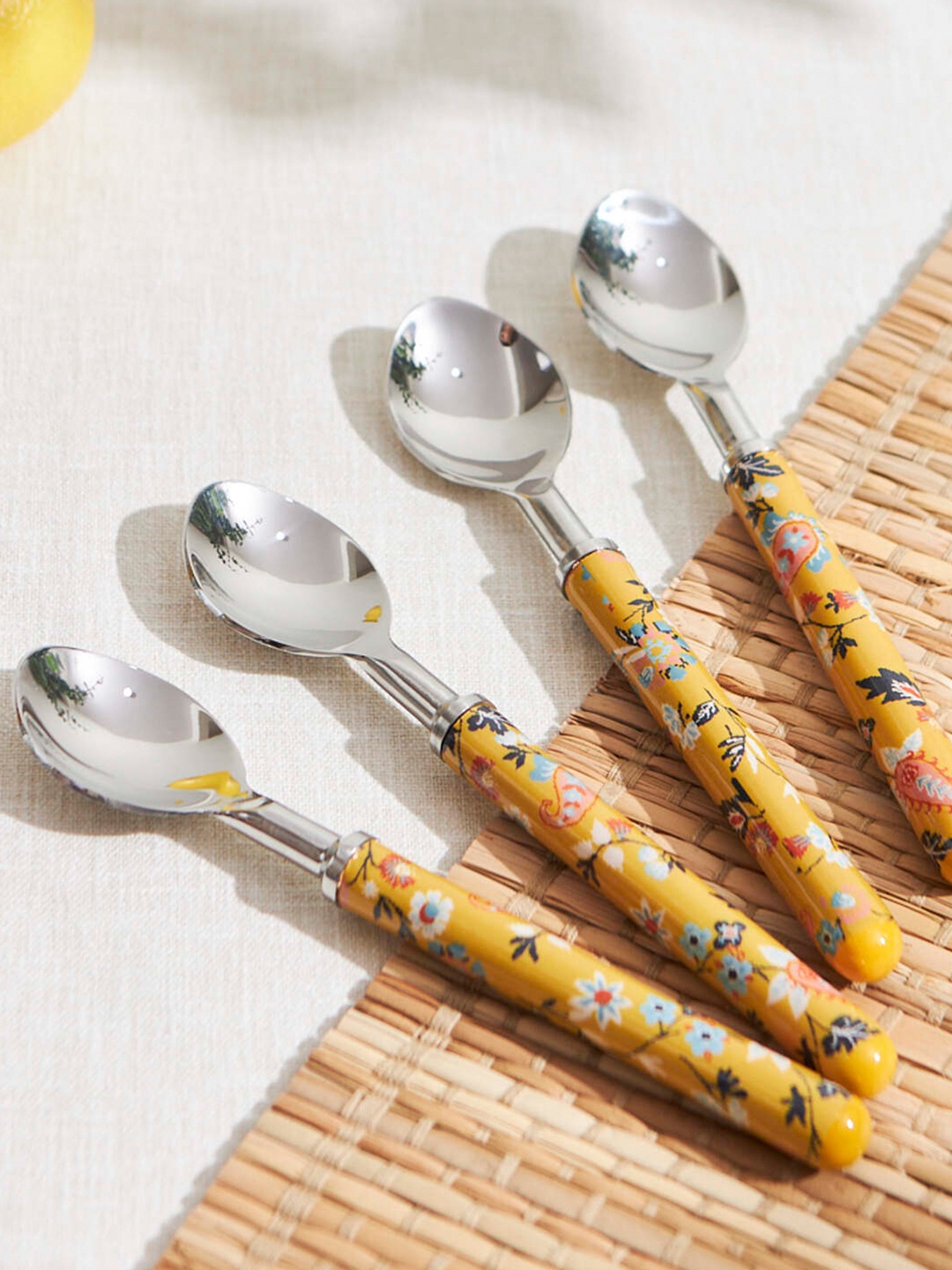 

Chumbak Yellow 4 Pieces Printed Spoons