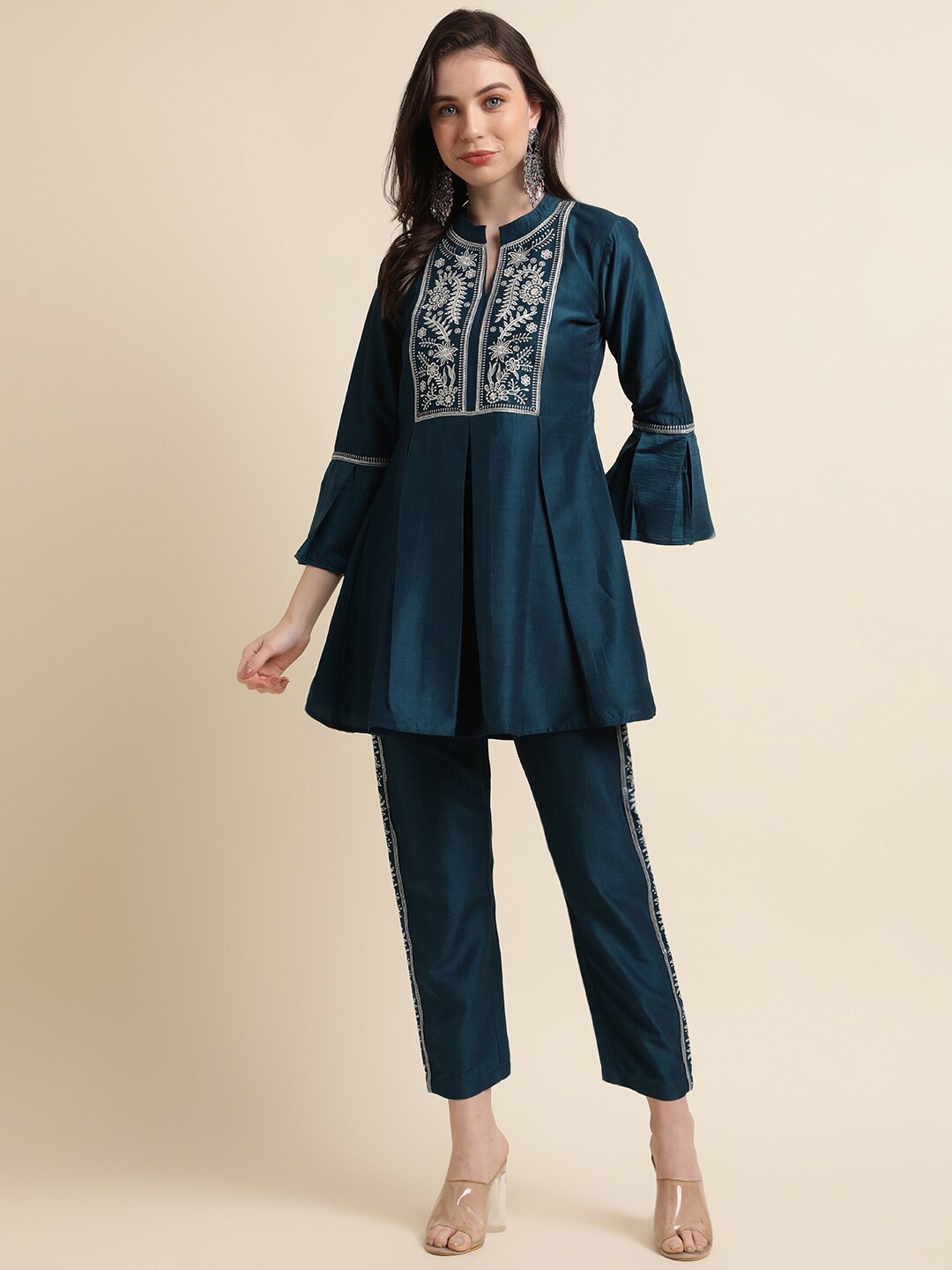 

Sangria Teal Blue & White Ethnic Motifs Embroidered A-Line Kurti With Trousers