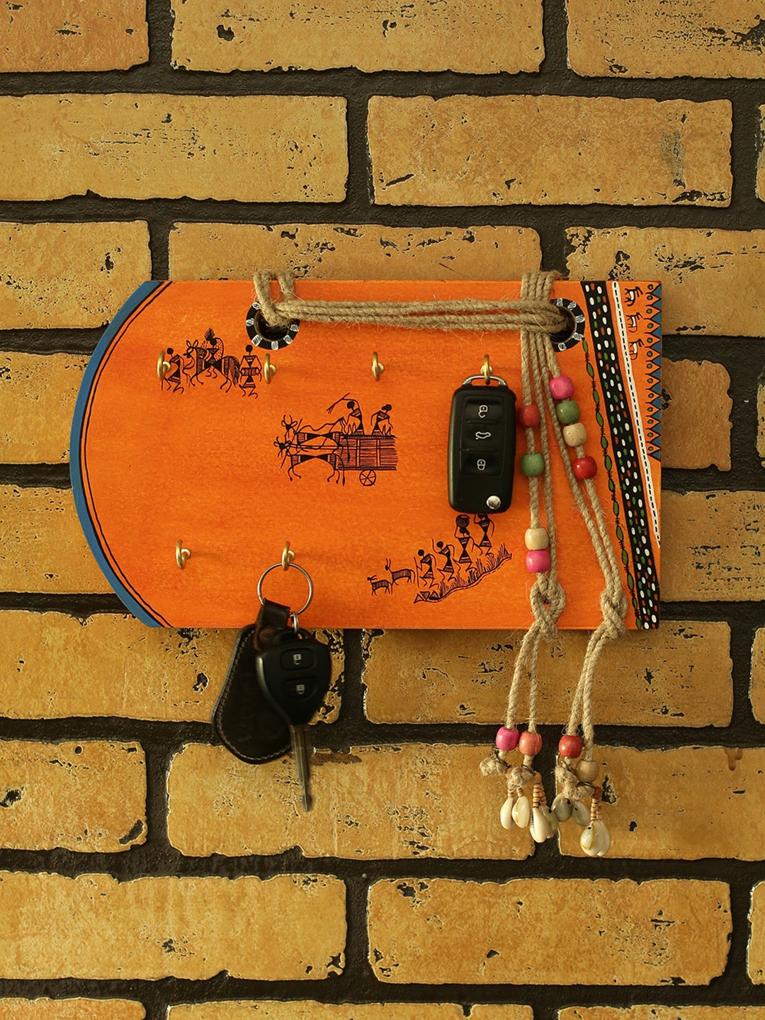 

ExclusiveLane Orange Warli Wood Hand-Painted Key Holder