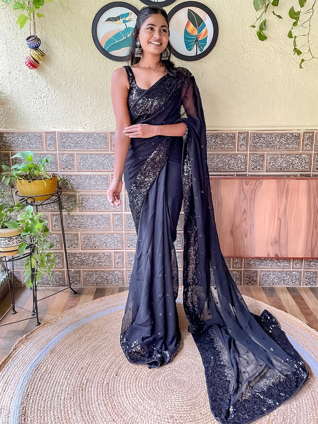 

Mitera Black Embellished Sequinned Poly Georgette Saree