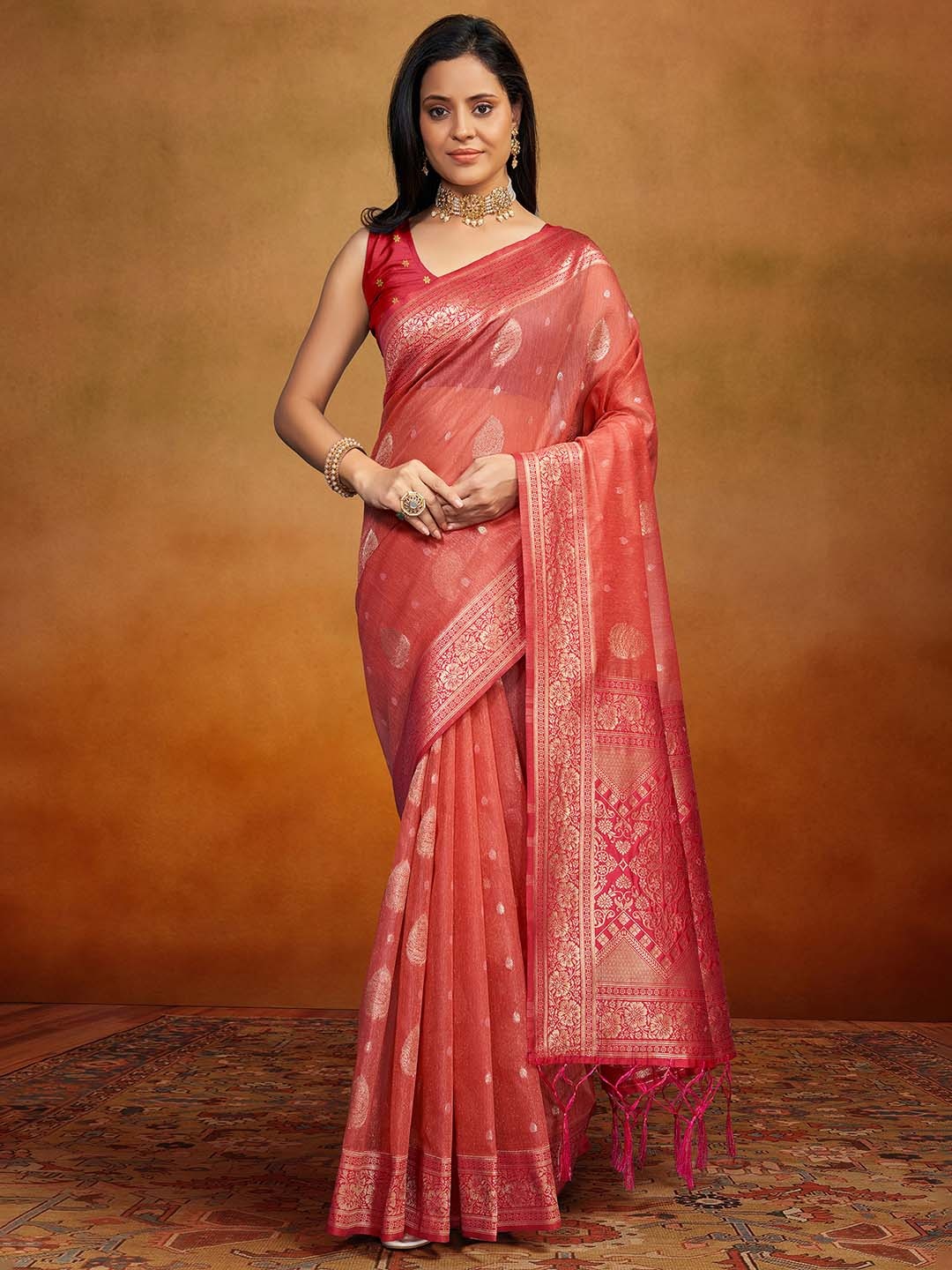 

Anouk Peach Coloured & Gold Toned Ethnic Motifs Woven Design Zari Satin Banarasi Saree