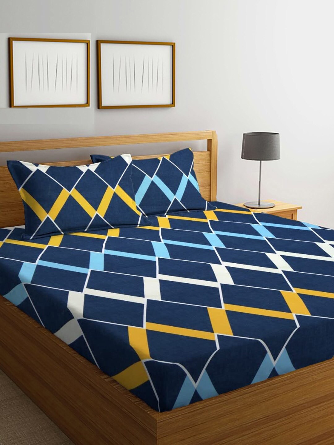

DECOMIZER Navy Blue & Yellow Printed Cotton 300 TC King Bedsheet with 2 Pillow Covers