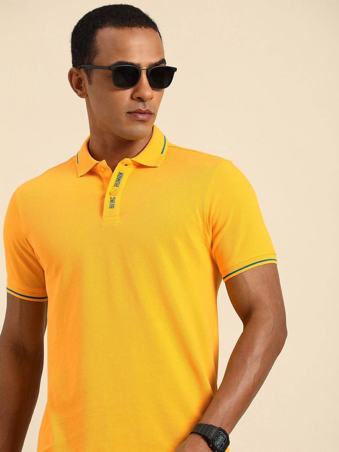 

Being Human Pure Cotton Solid Polo Collar Casual T-shirt, Yellow