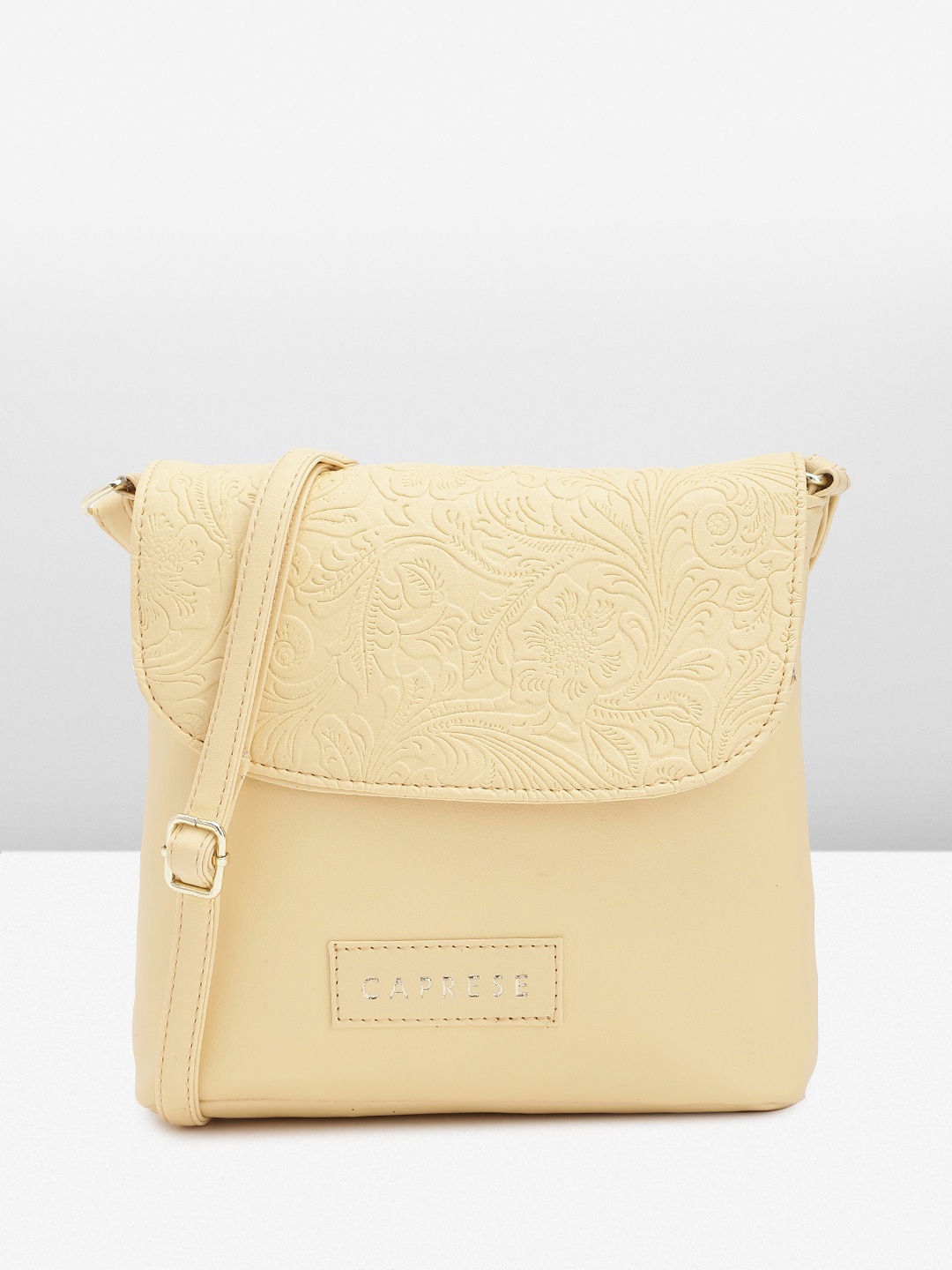 

Caprese Yellow Floral Textured Structured Sling Bag