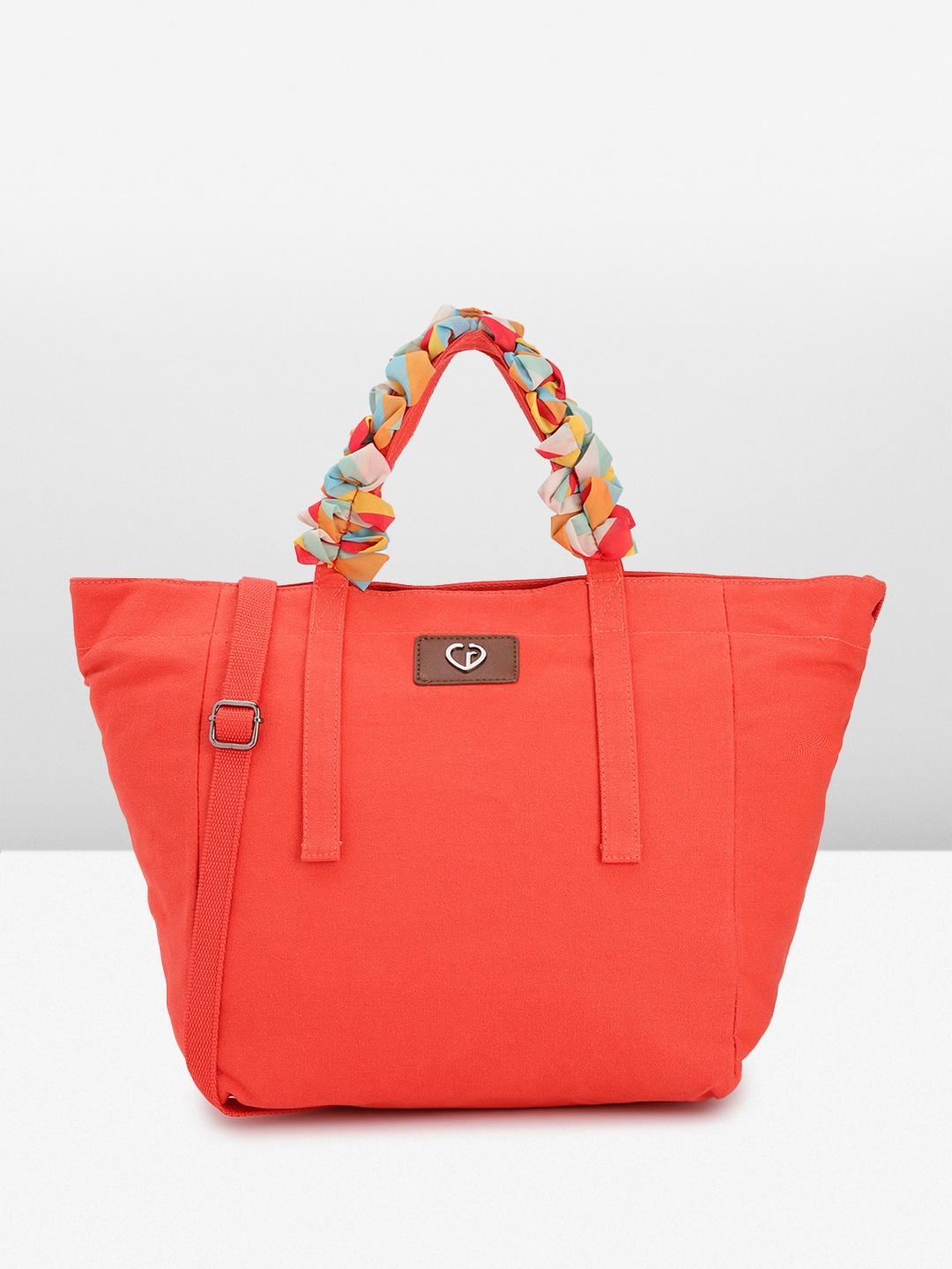 

Caprese Women Solid Handheld Bag, Red