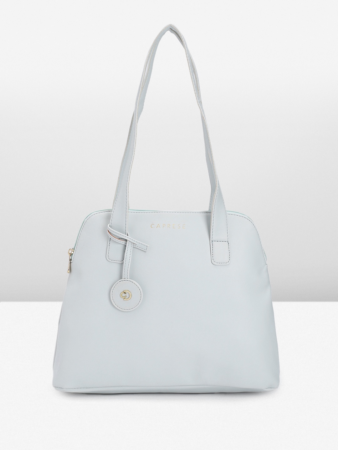 

Caprese Women Solid Shoulder Bag, Blue