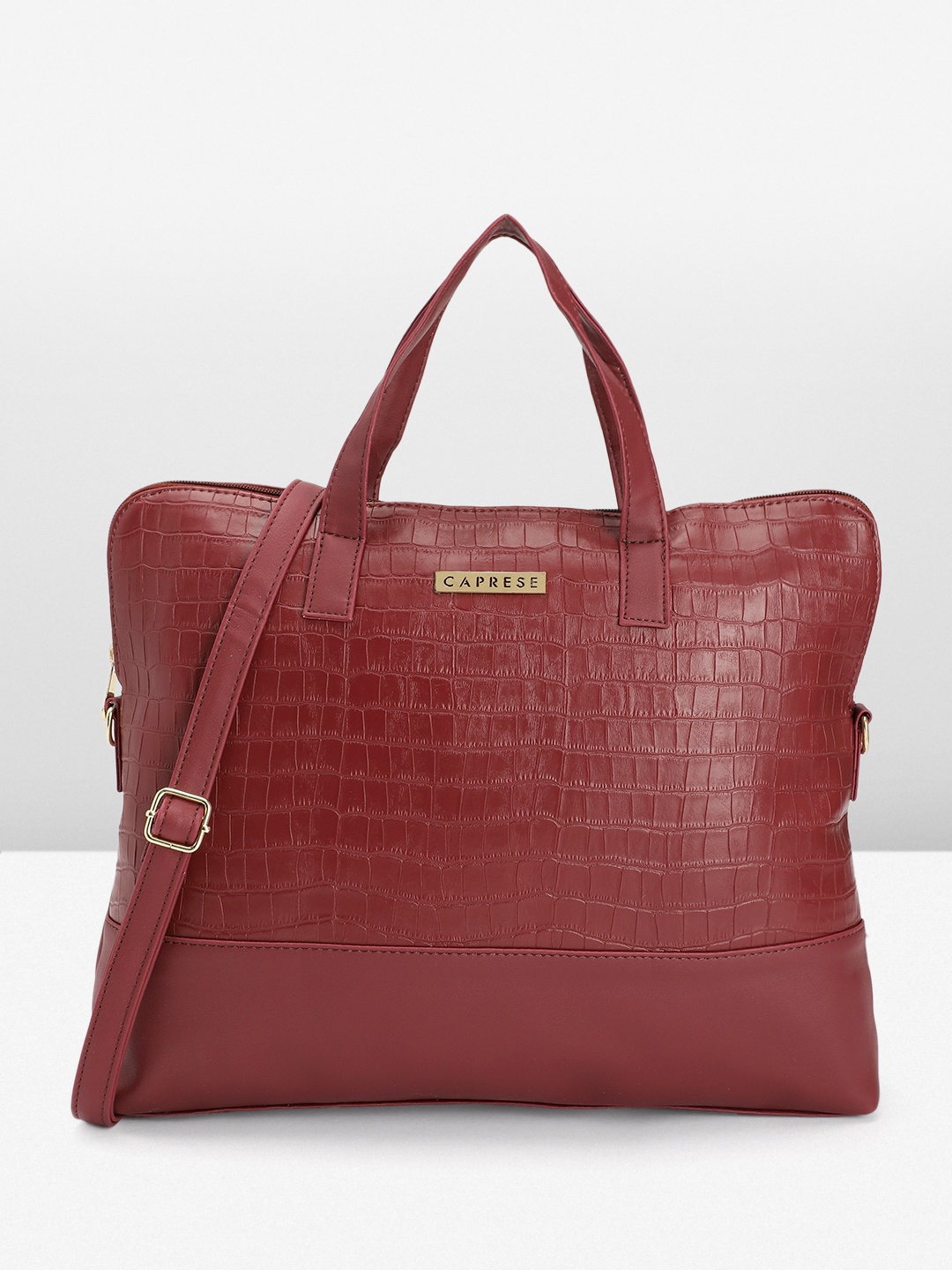 

Caprese Women Textured Handheld Bag, Maroon
