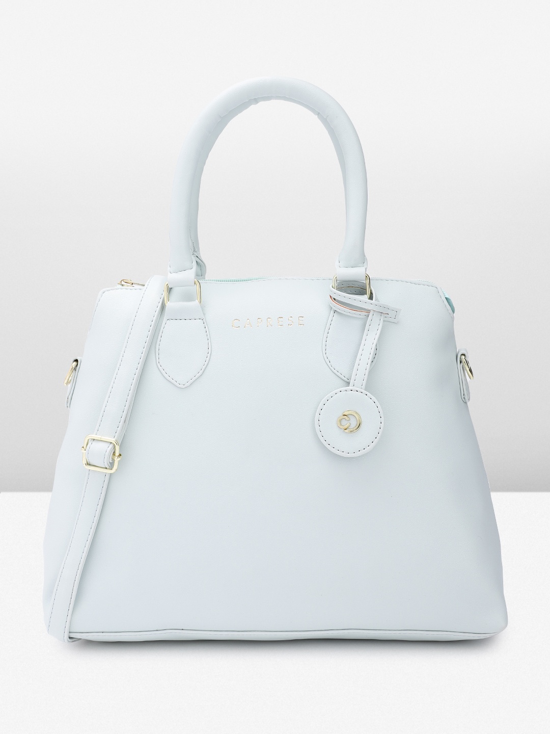 

Caprese Women Solid Handheld Bag, Blue