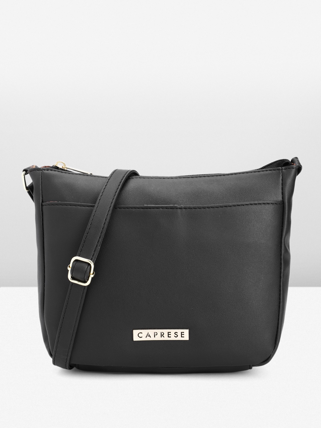 

Caprese Women Solid Sling Bag, Black