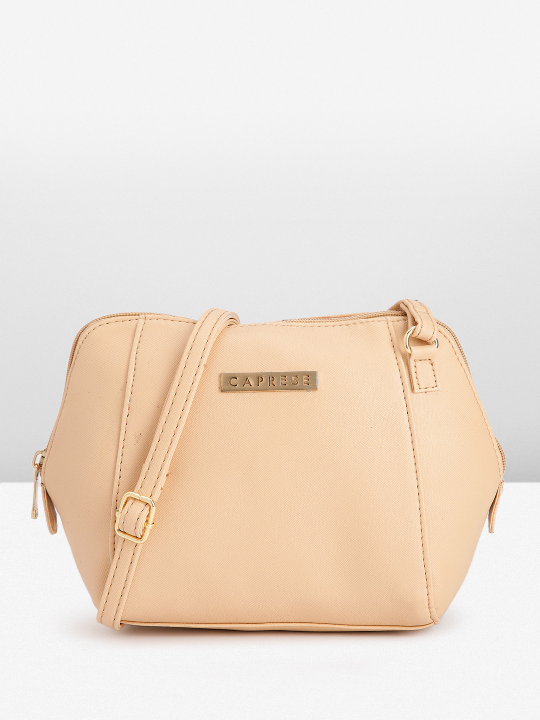 

Caprese Abstract Textured Structured Sling Bag, Beige