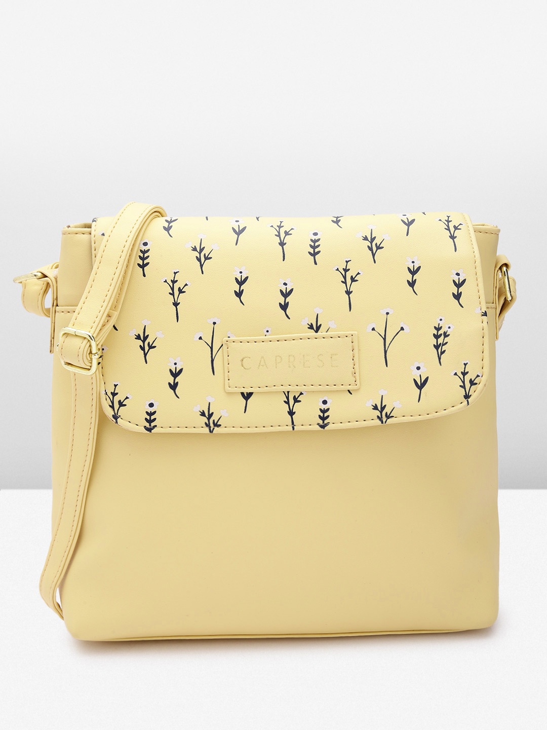 

Caprese Floral Printed Detail Structured Sling Bag, Yellow