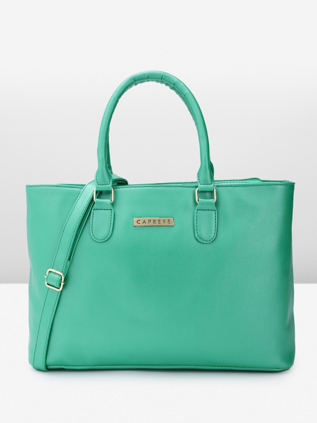 

Caprese Women Solid Handheld Bag, Green
