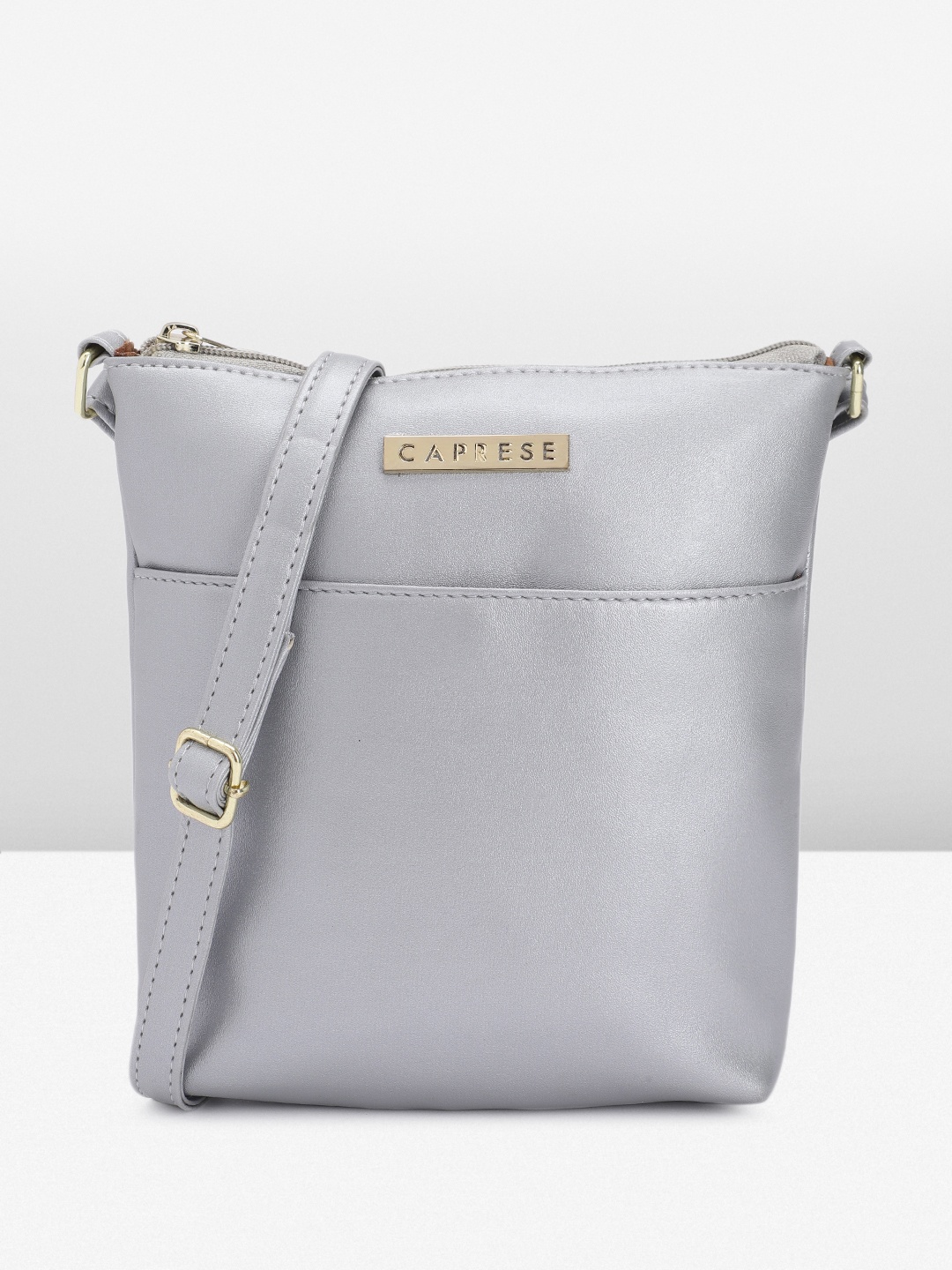 

Caprese Women Solid Sling Bag, Silver