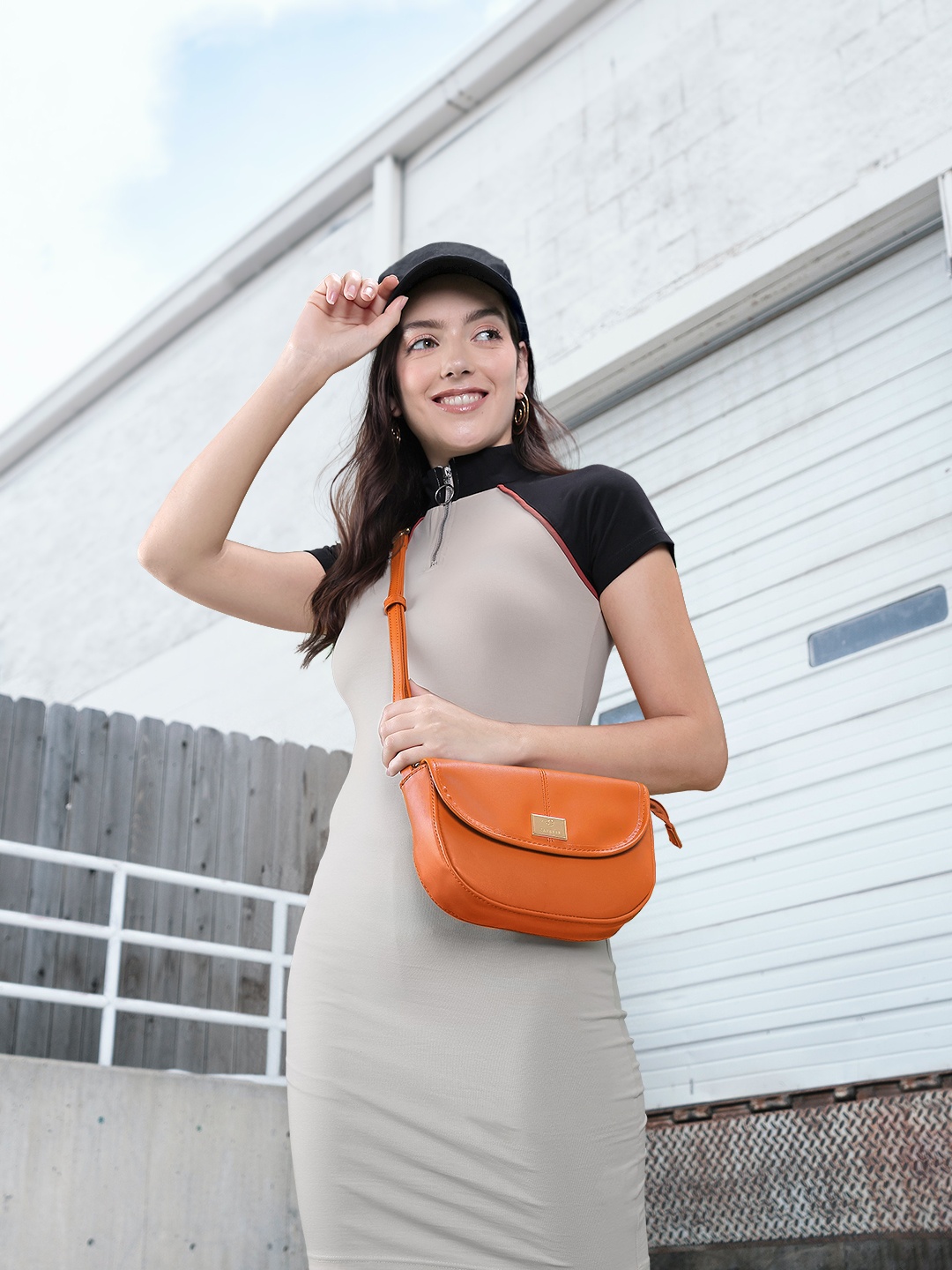 

Caprese Solid Half Moon Sling Bag, Rust