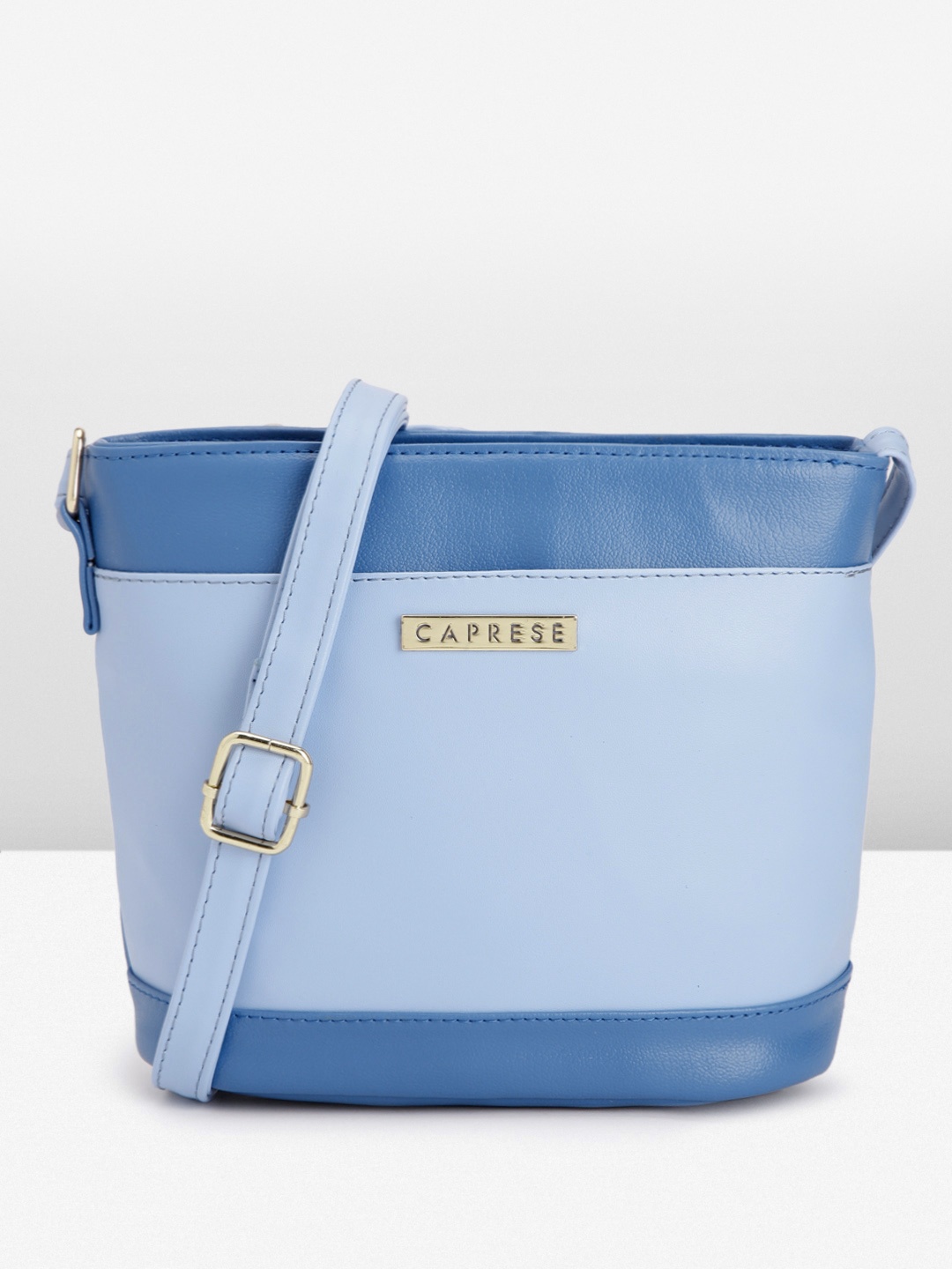 

Caprese Women Solid Sling Bag, Blue