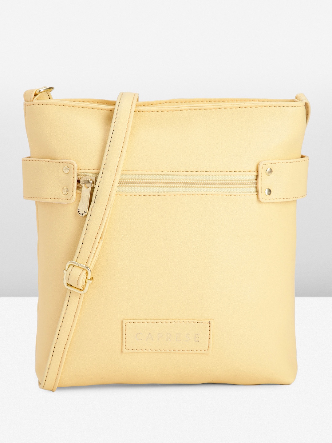 

Caprese Solid Structured Sling Bag, Yellow