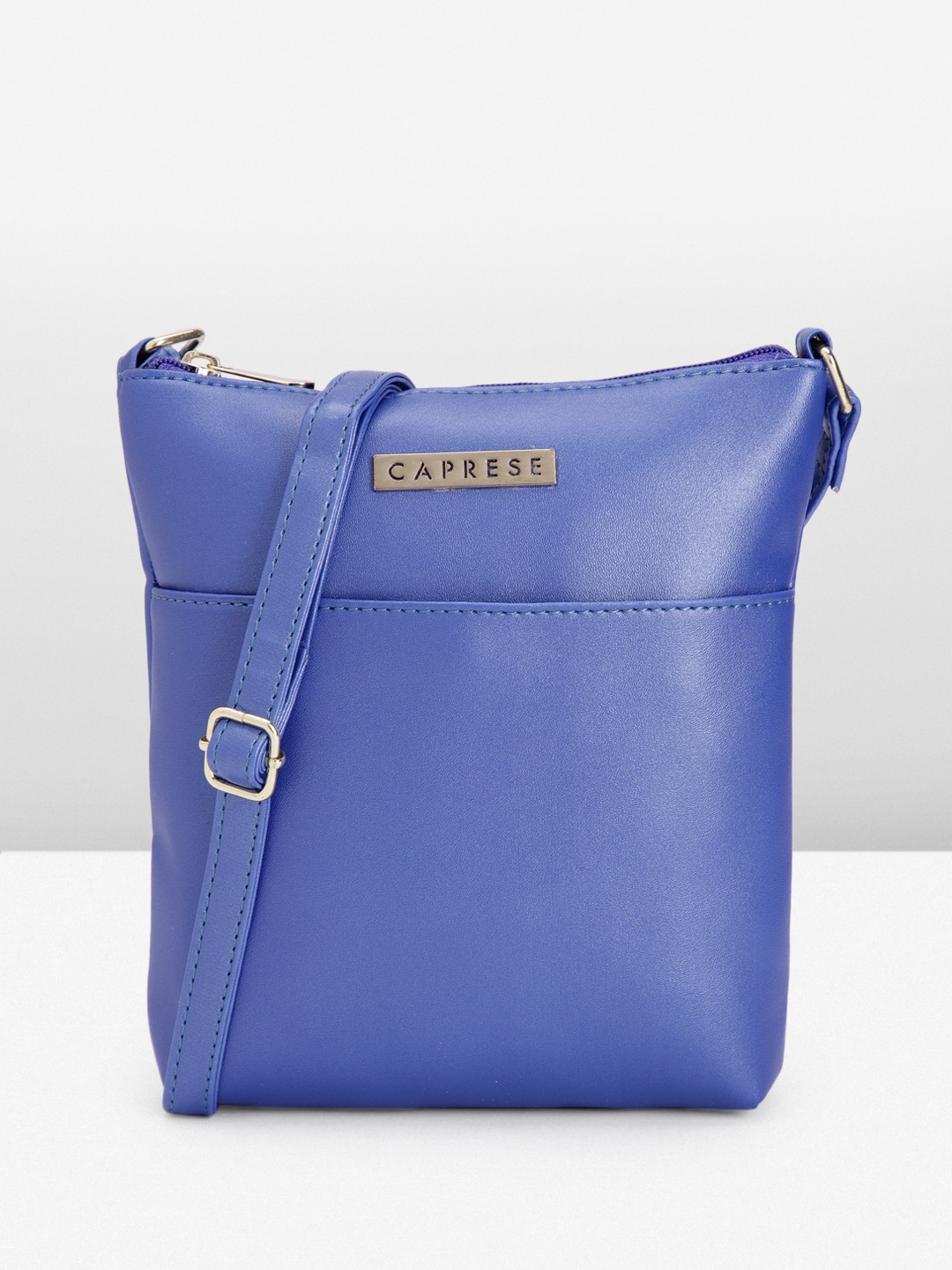 

Caprese Women Solid Sling Bag, Blue
