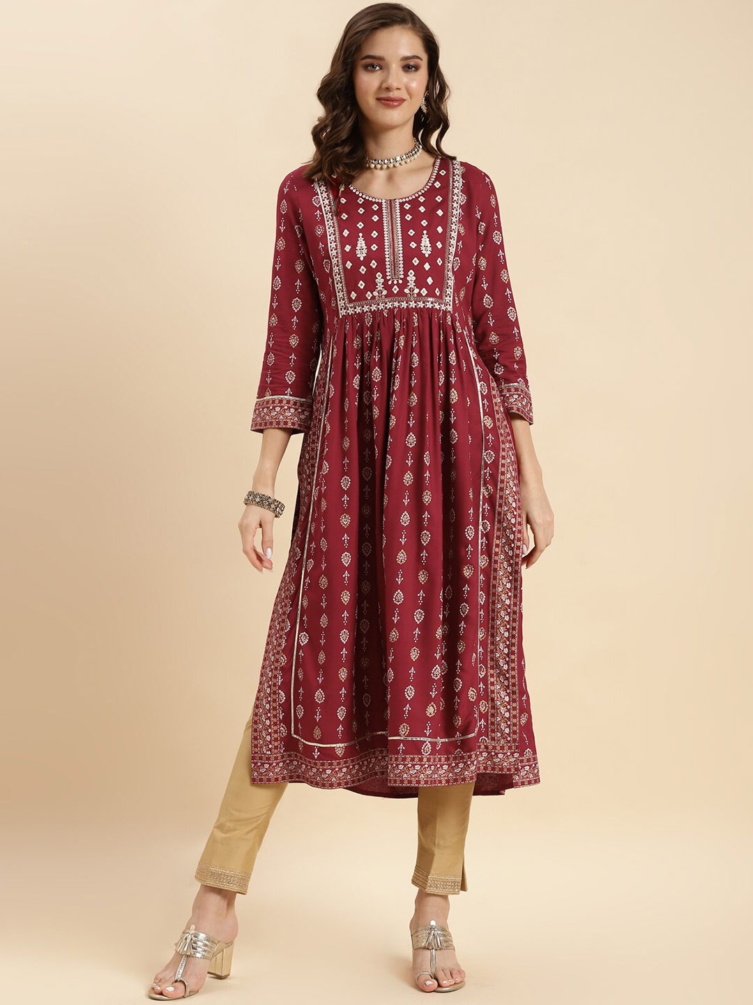 

Rangita Ethnic Motifs Printed Sequinned Detailed Pleated A-Line Kurta, Maroon