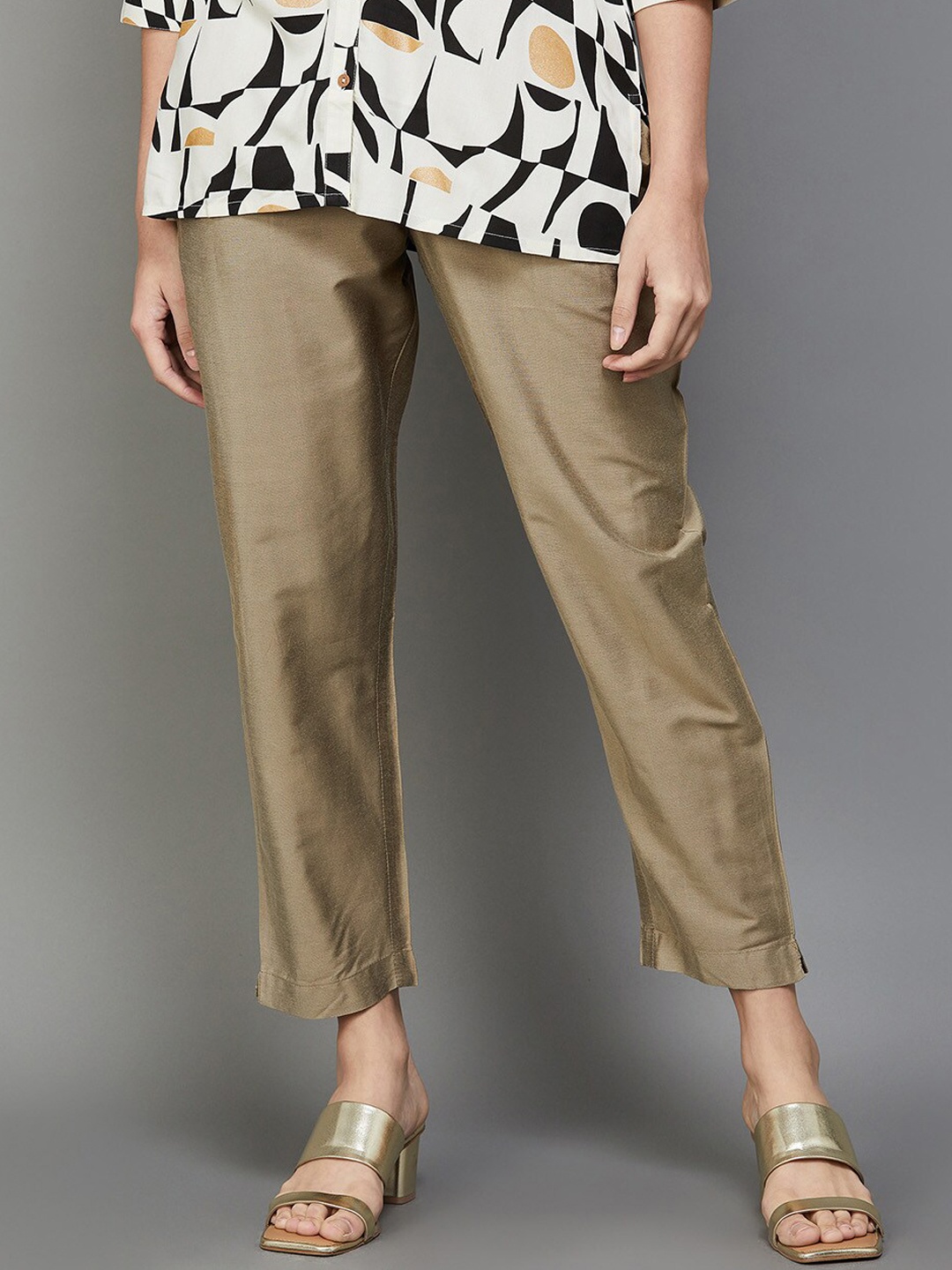 

Melange by Lifestyle Women Plain Mid-Rise Cropped Trousers, Gold