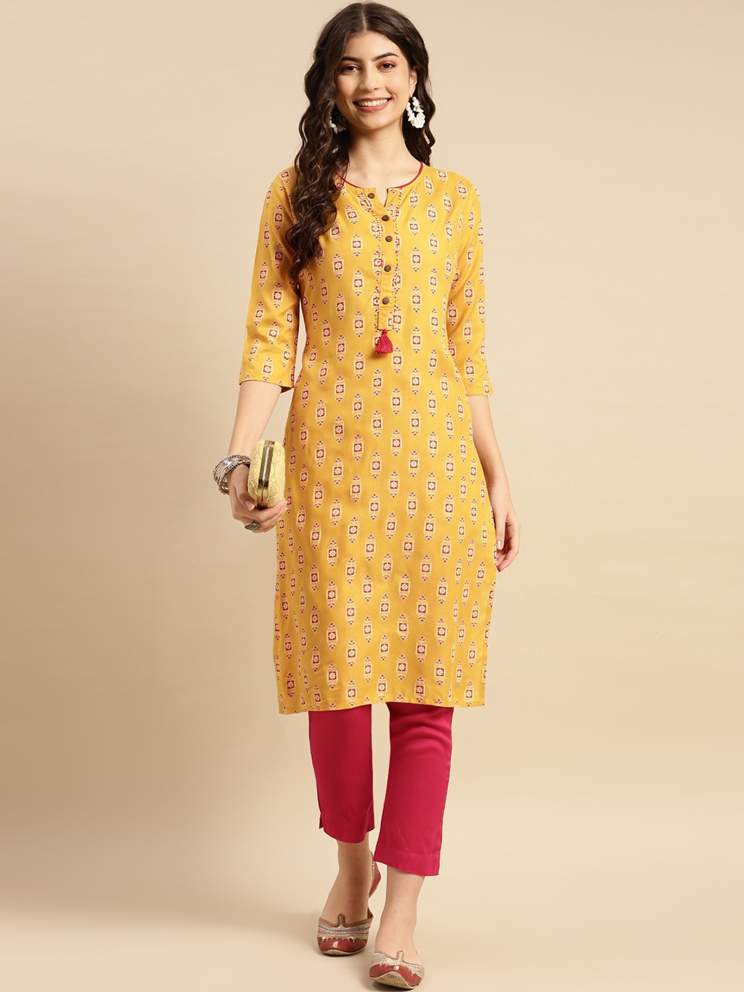

Rangita Ethnic Motifs Printed Sequinned Straight Kurta With Trousers, Mustard