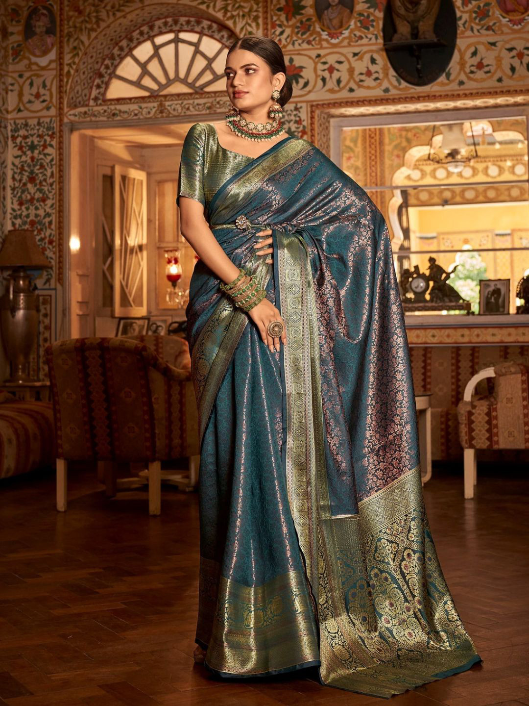 

Mitera Woven Design Zari Ikat Saree, Green