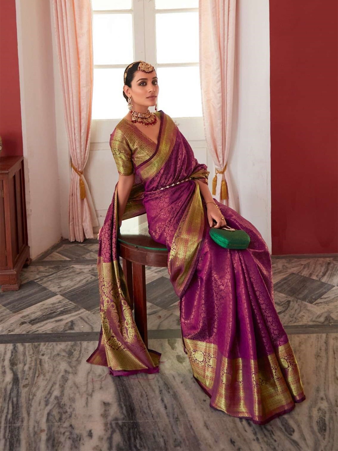 

Mitera Purple & Gold-Toned Ethnic Motifs Woven Design Zari Banarasi Saree