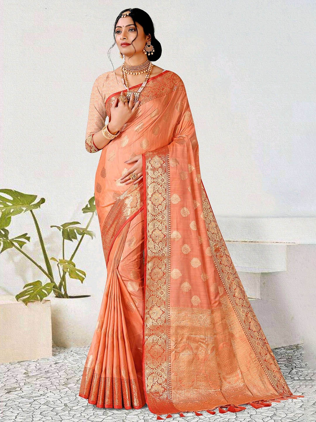 

Mitera Coral & Red Ethnic Motifs Woven Design Zari Banarasi Saree