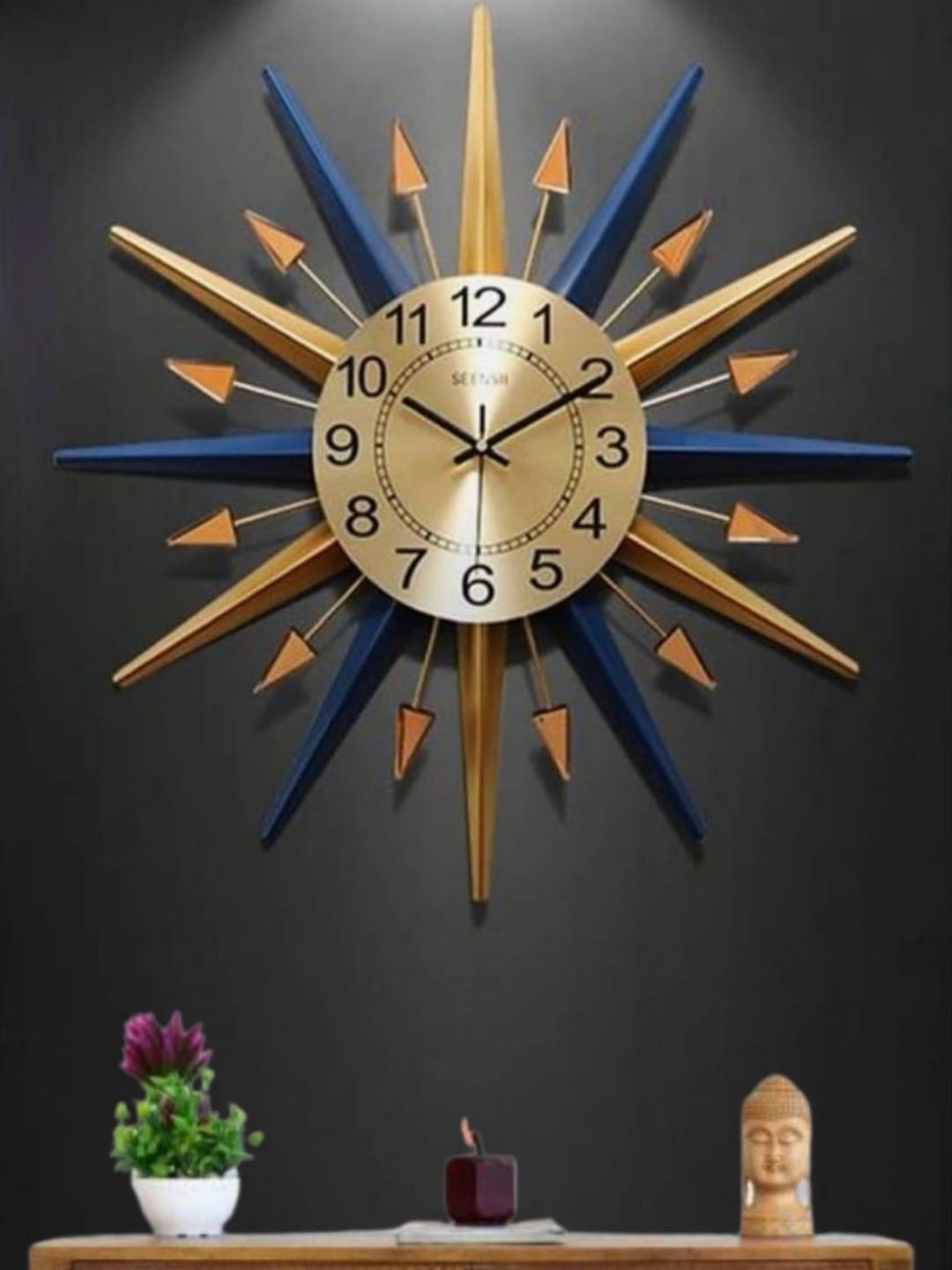 

The Art House Gold-Toned & Blue Printed Abstract Shaped Contemporary Wall Clock
