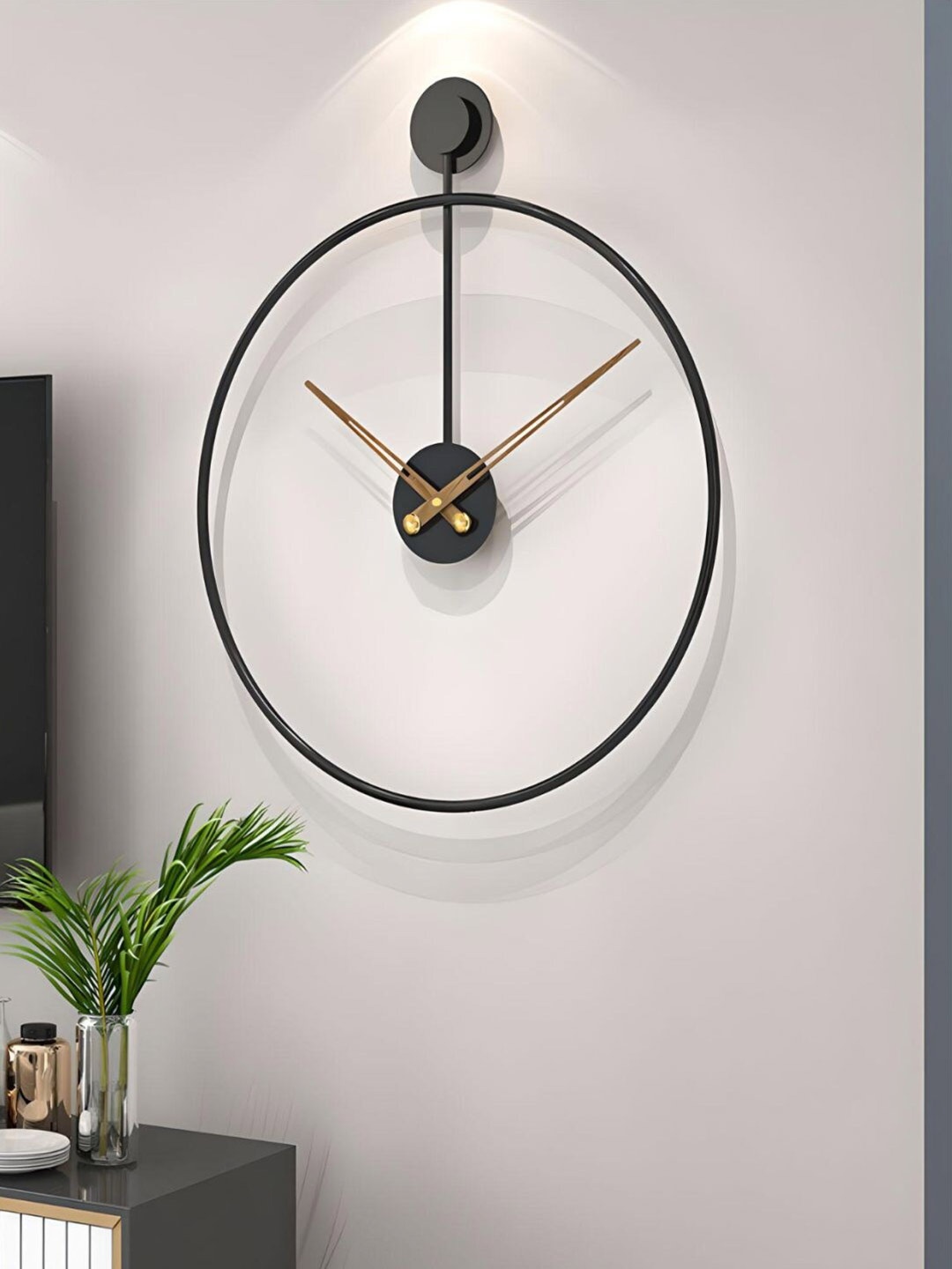 

The Art House Black & Gold-Toned Abstract Shaped Contemporary Wall Clock