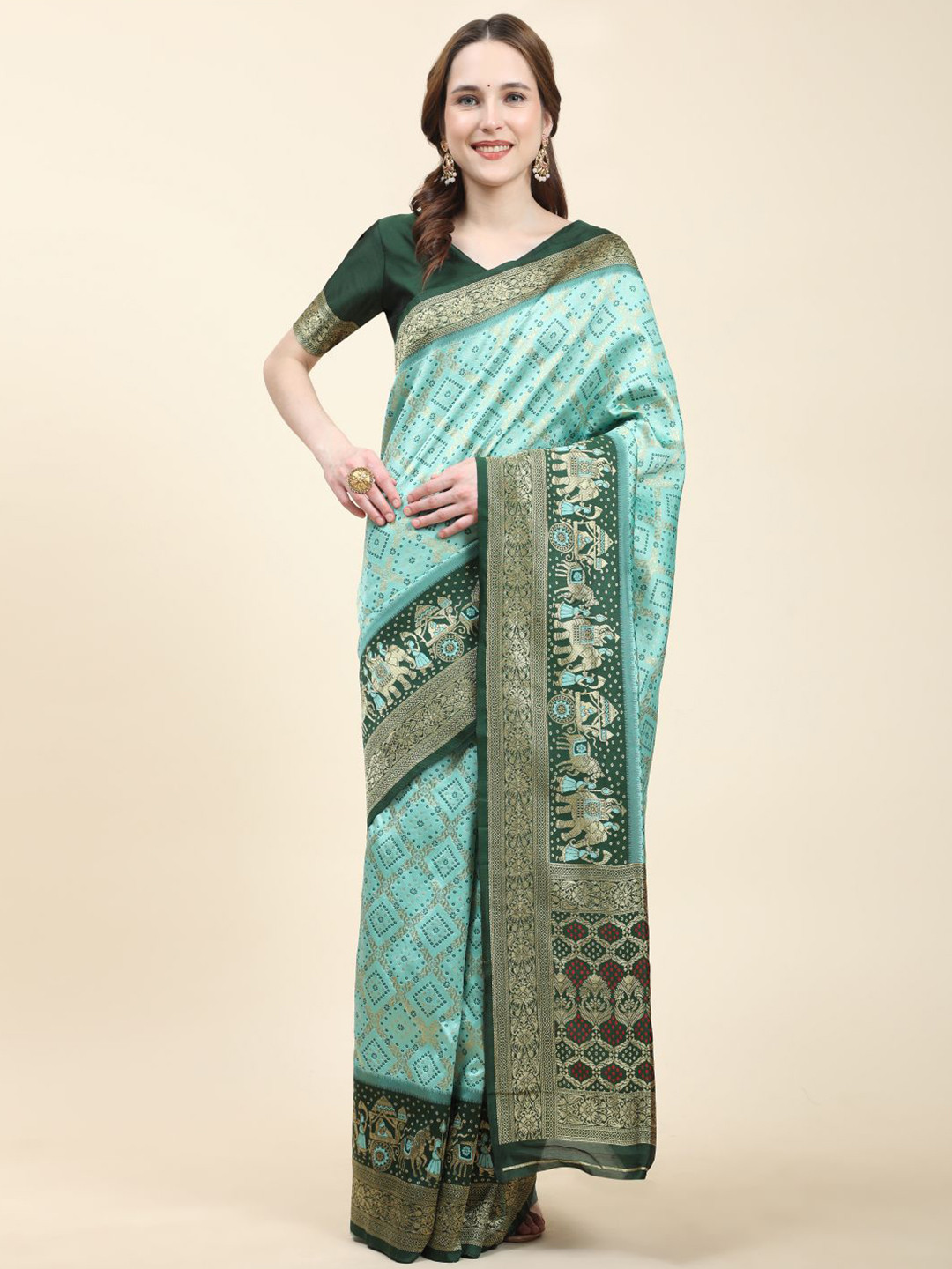 

Anouk Woven Design Zari Patola Saree, Green
