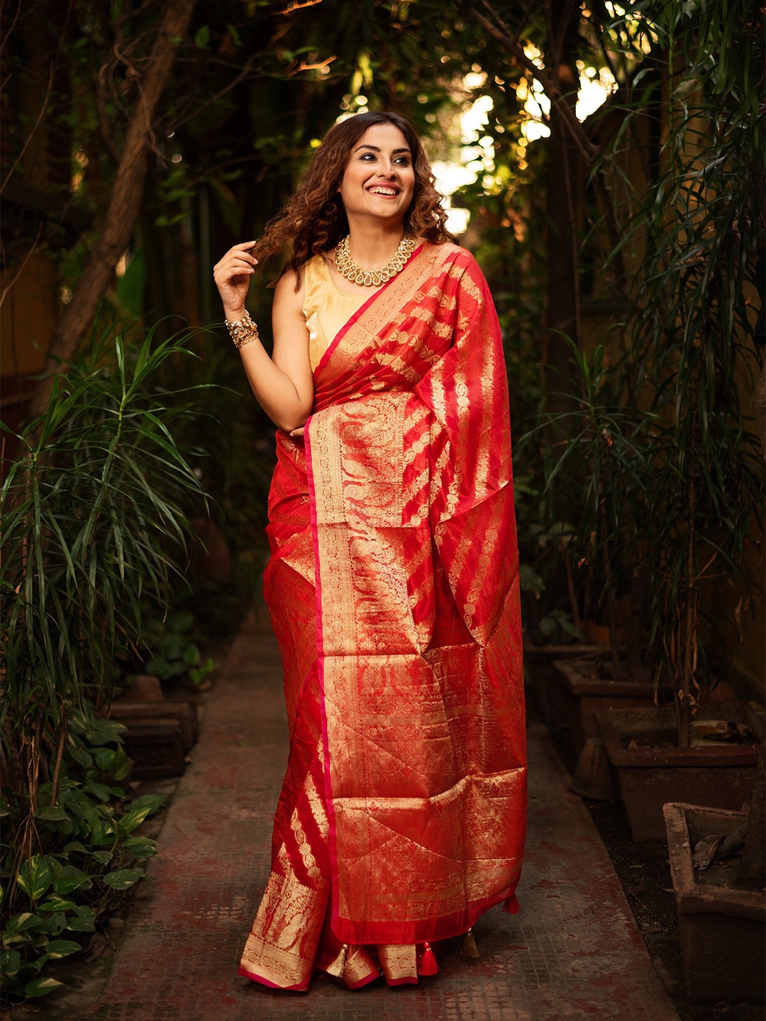 

Anouk Red & Gold-Toned Woven Design Zari Organza Leheriya Saree