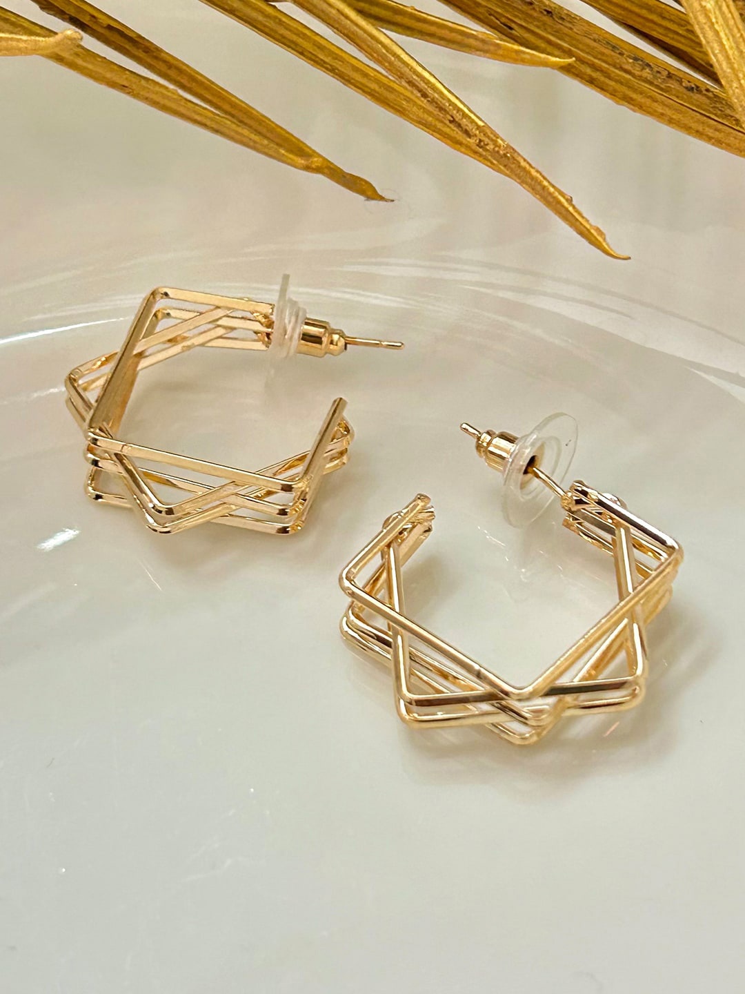 

Ayesha Gold-Plated Contemporary Studs Earrings