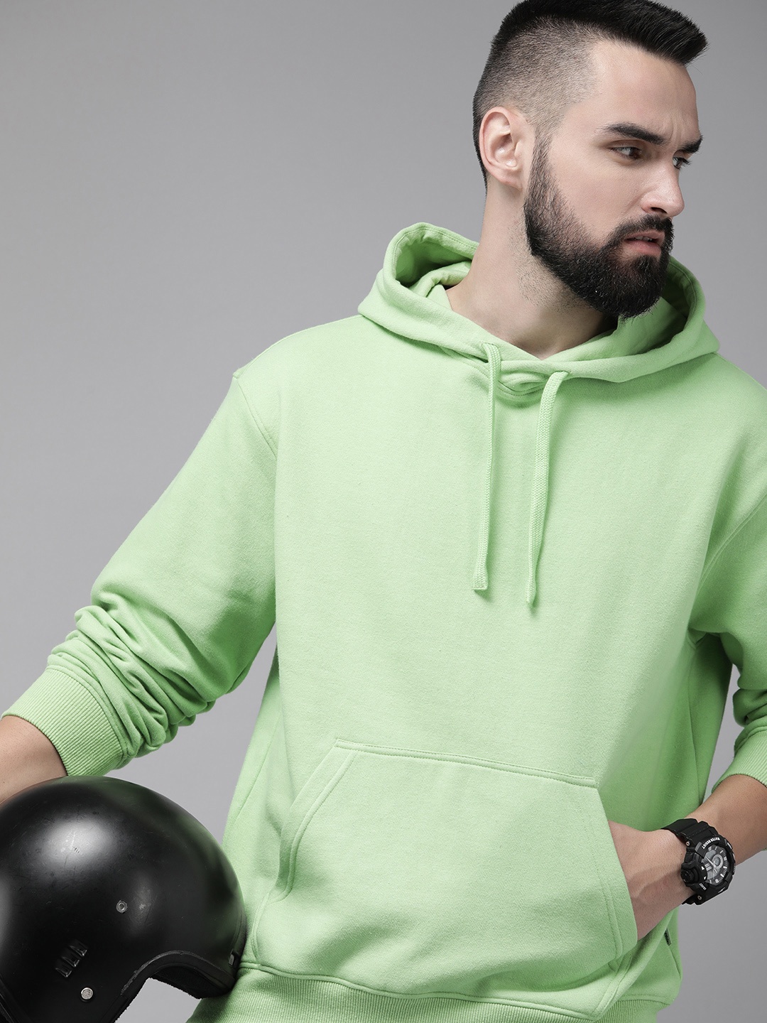 

Roadster Men Solid Hooded Sweatshirt, Green