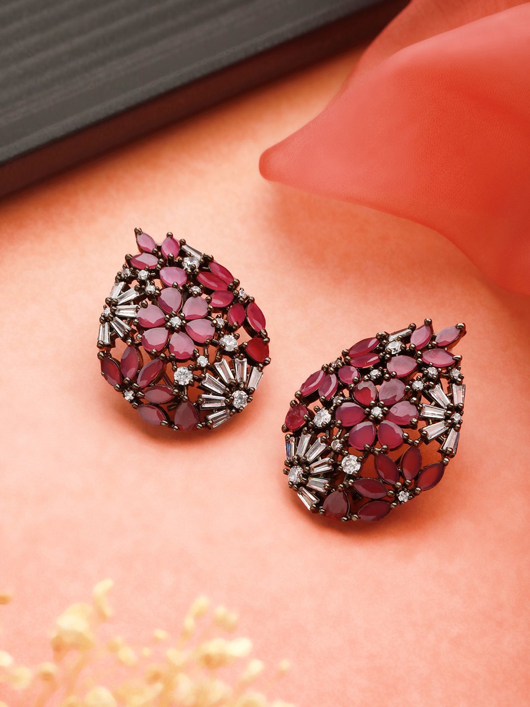 

Priyaasi Silver Plated Contemporary Studs Earrings