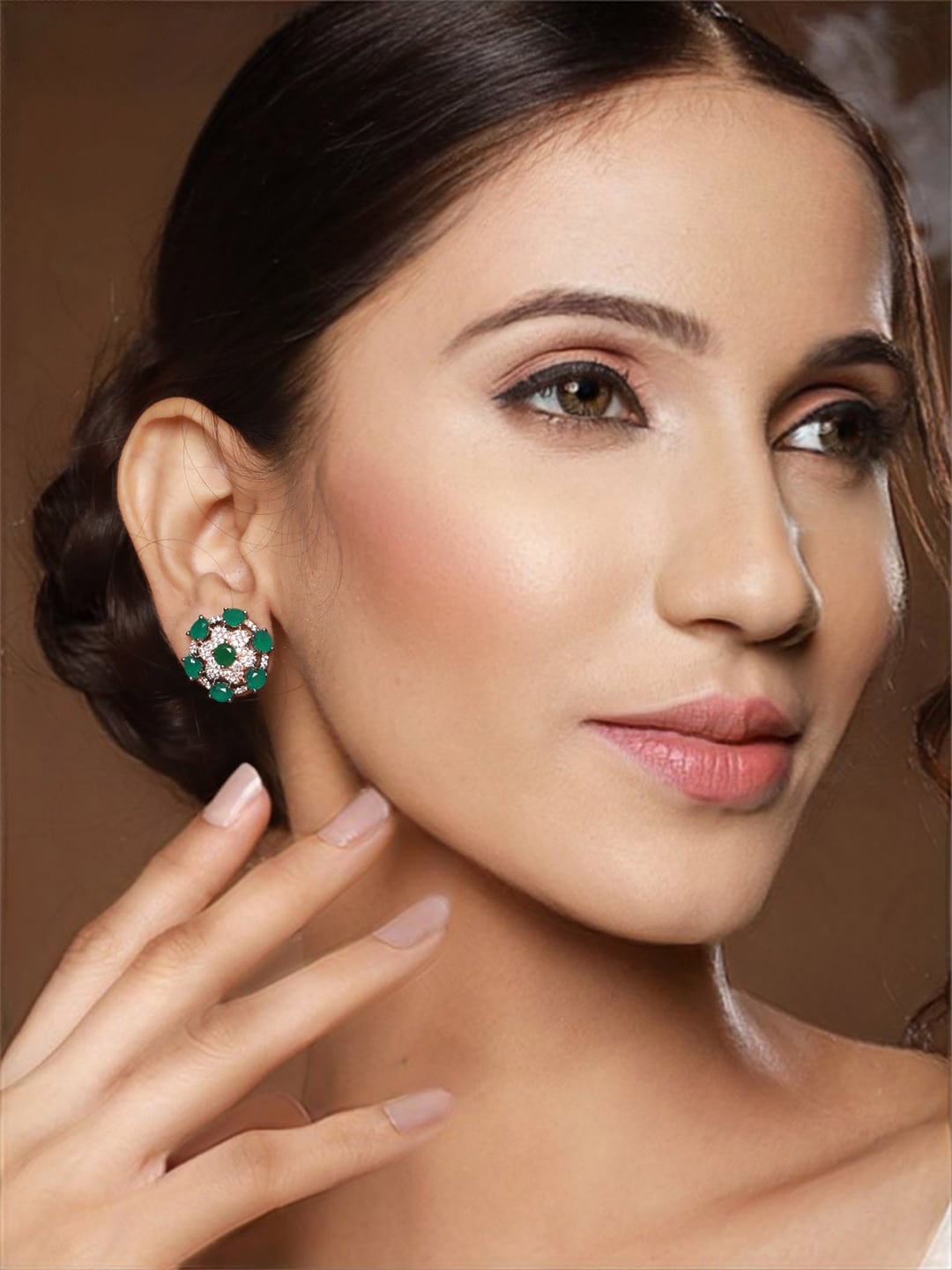

Priyaasi Rose Gold Plated American Diamond Studded Studs Earrings