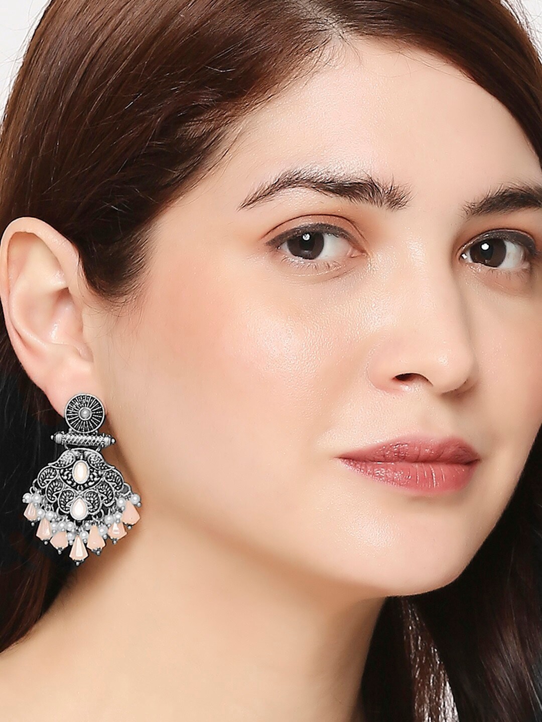 

OOMPH Peacock Shaped Artificial Stones & Beads Ethnic Drop Earrings, Peach
