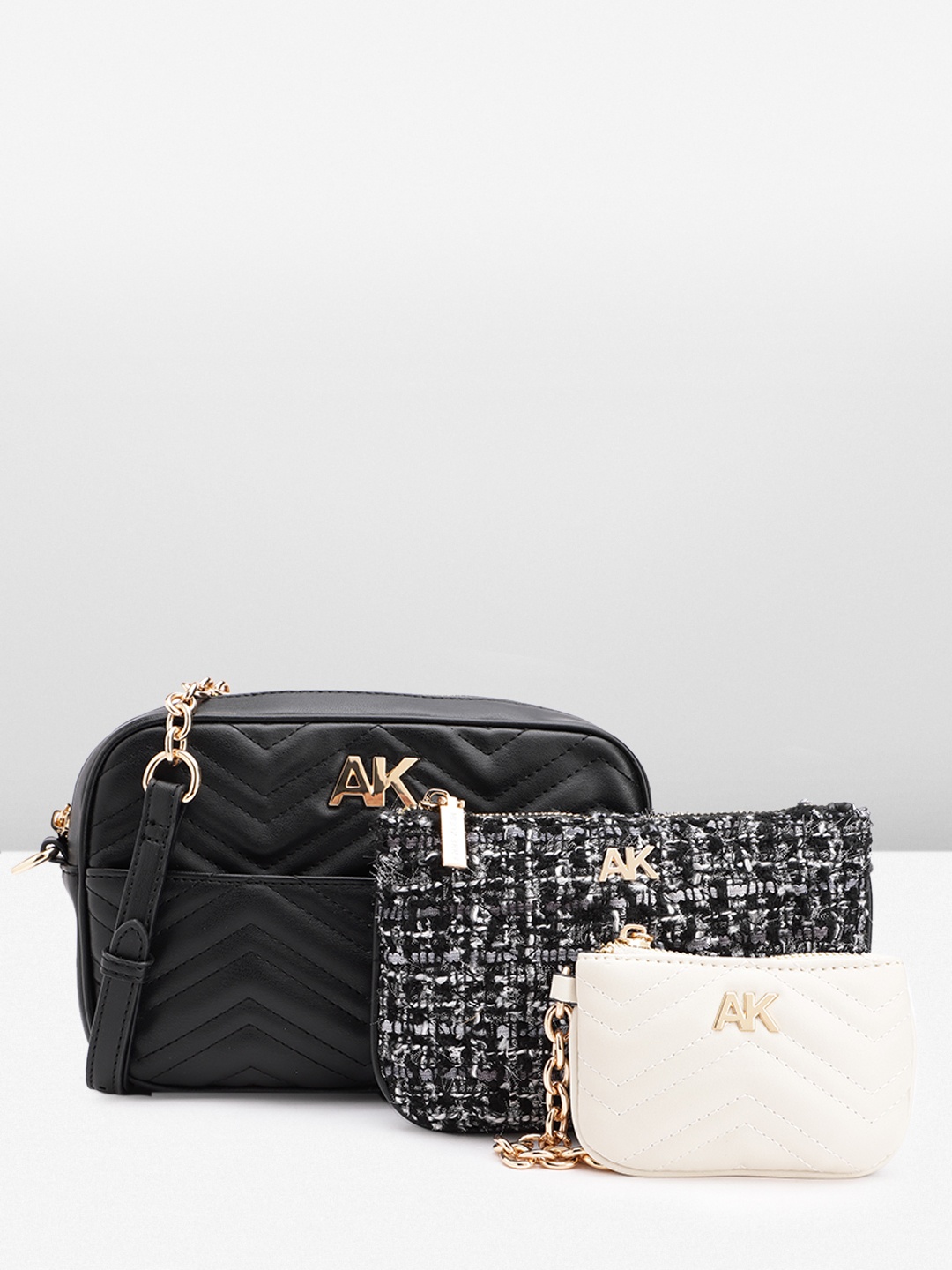 

ANNE KLEIN Structured Sling Bag With Quilted Detail, Black