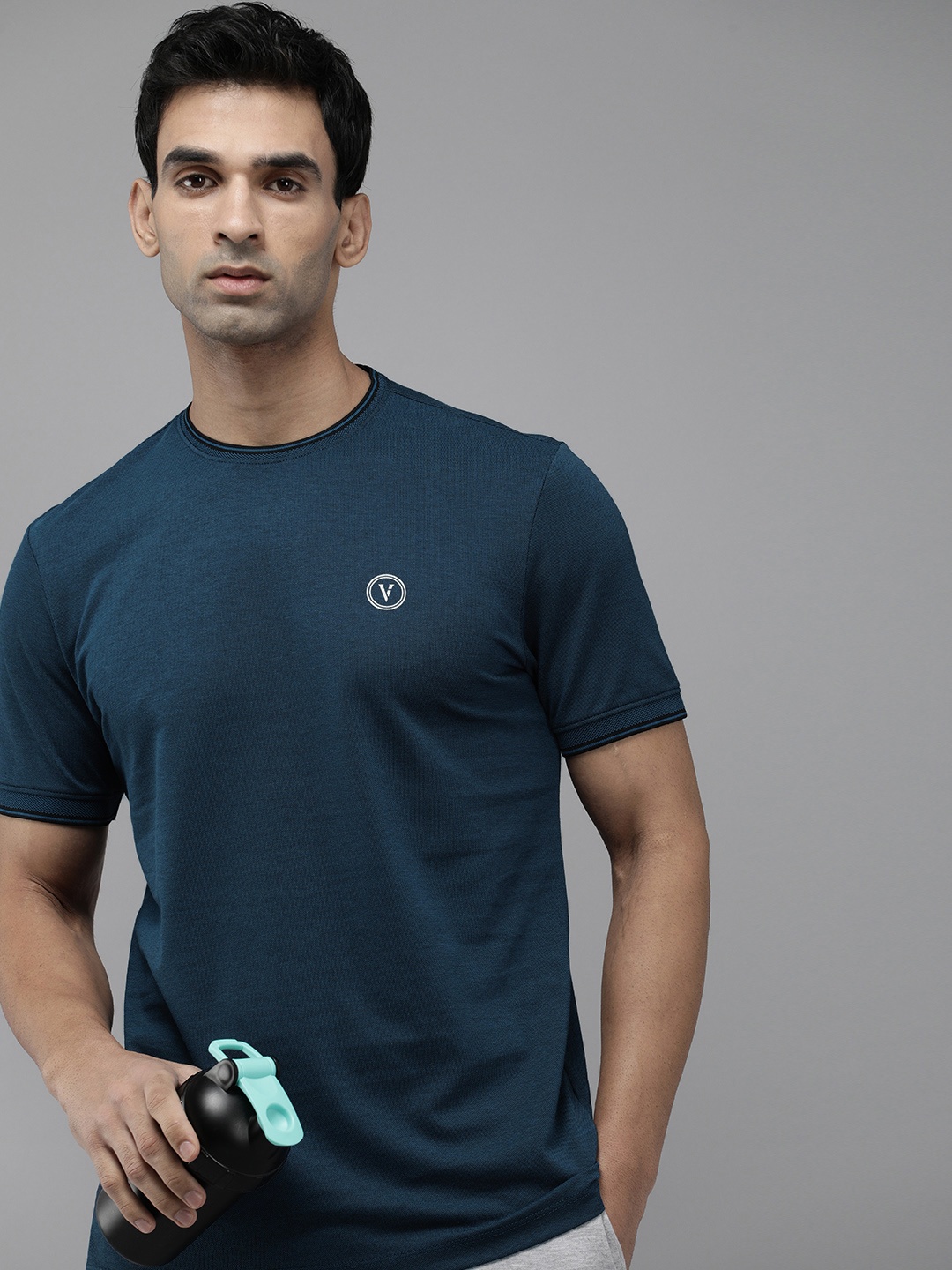 

Van Heusen Flex Men Solid Slim Fit T-shirt, Teal