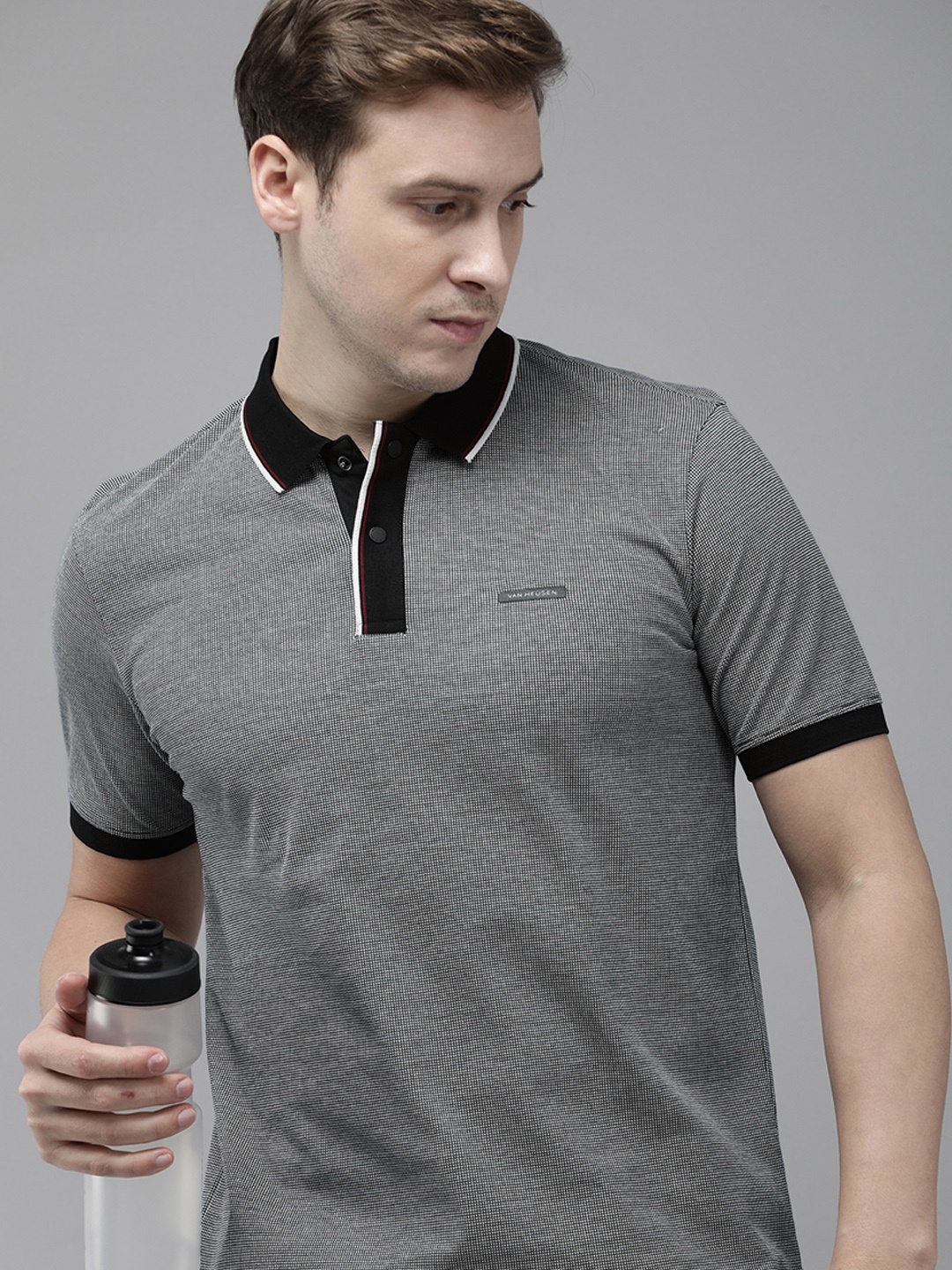 

Van Heusen Flex Men Self Design Polo Collar Pure Cotton T-shirt, Navy blue