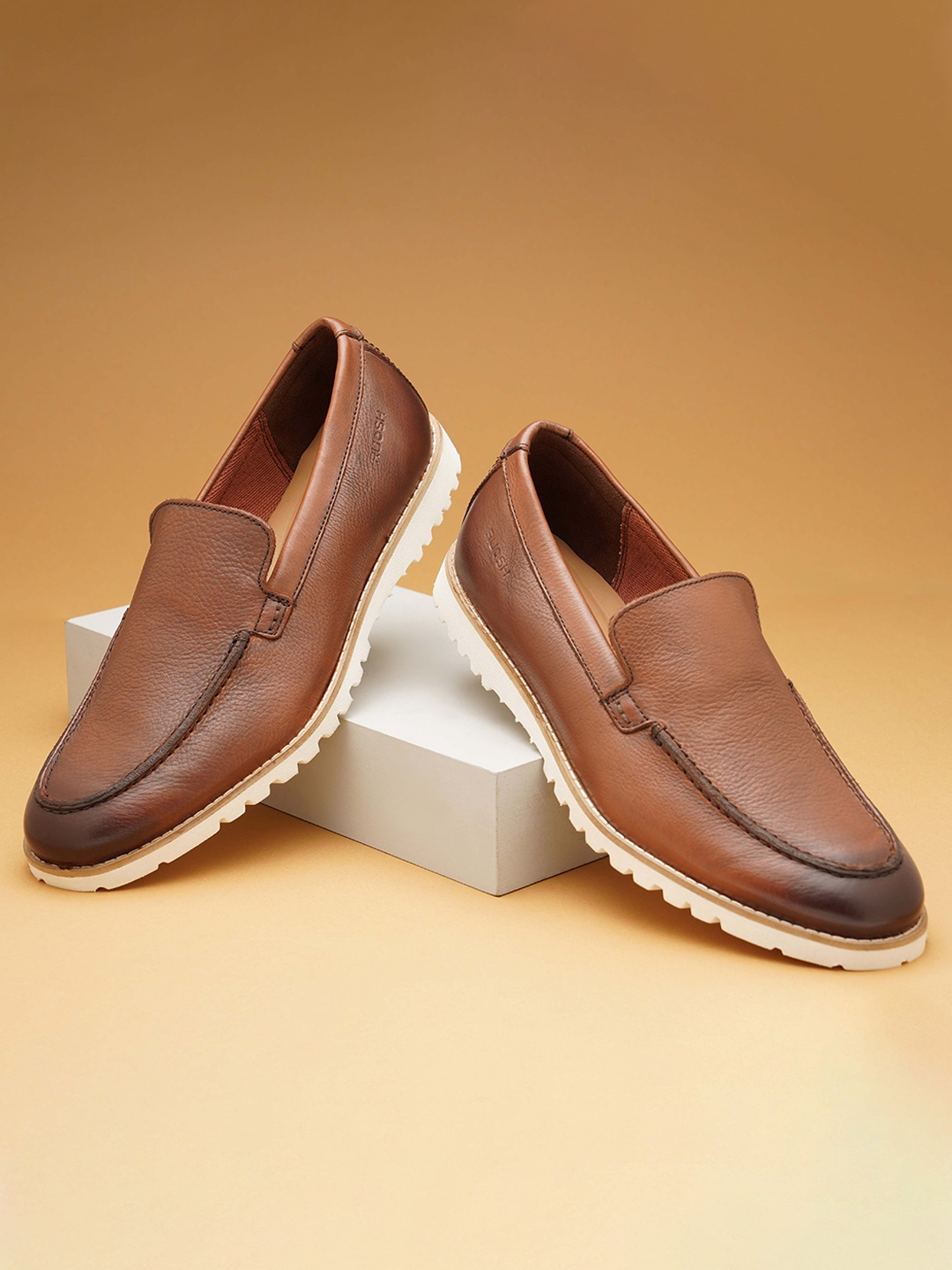 

Ruosh Men Textured Leather Loafers, Brown