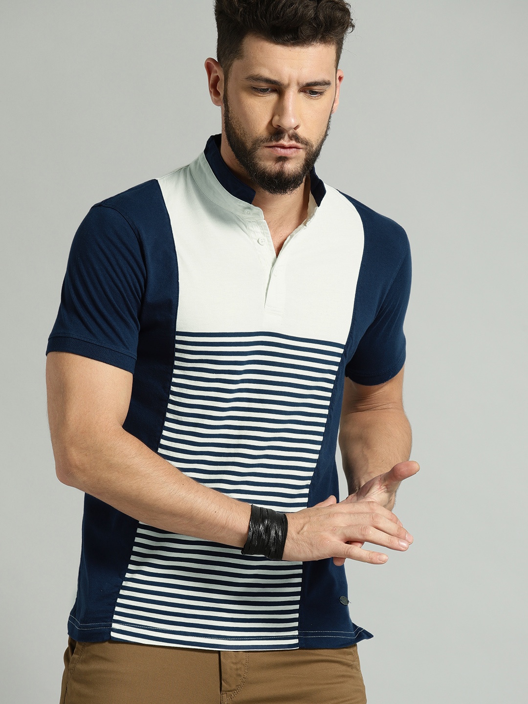 

Roadster Men White & Navy Blue Striped T-shirt