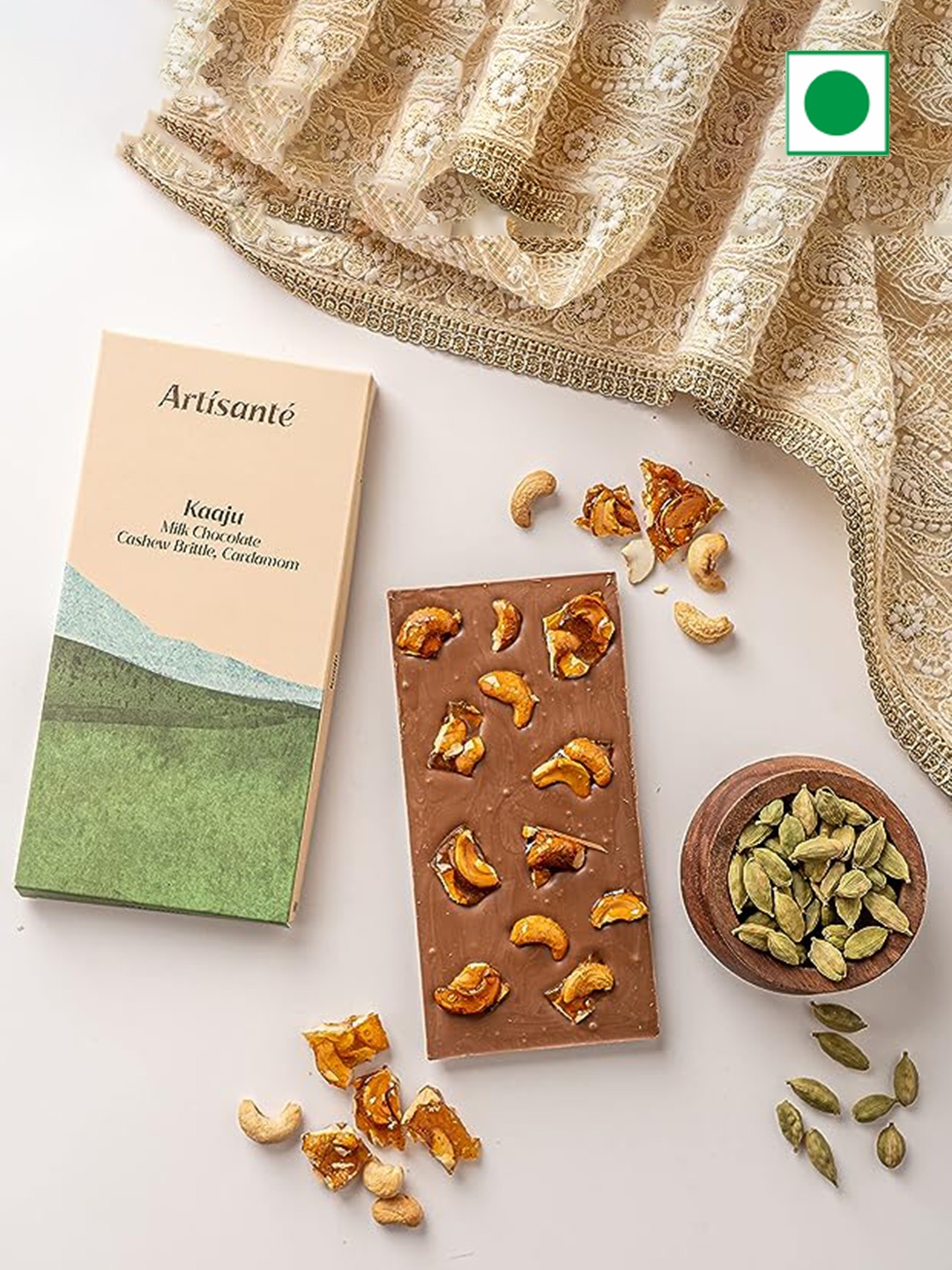 

Artisante Kaaju Milk Chocolate Cashew Brittle Cardamom- 80 gms, Brown