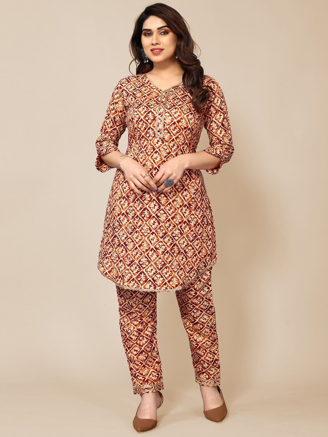

TITANIUM SILK INDUSTRIES PVT. LTD. Ethnic Motifs Printed Regular Kurta with Trousers, Orange