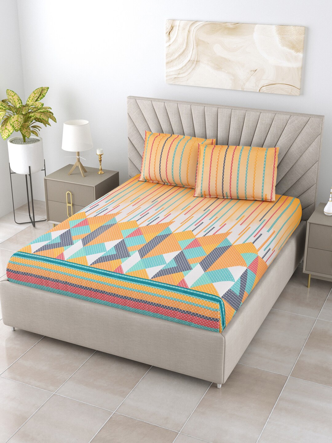 

BOMBAY DYEING Supercale Orange Printed Cotton 144 TC King Bedsheet with 2 Pillow Covers